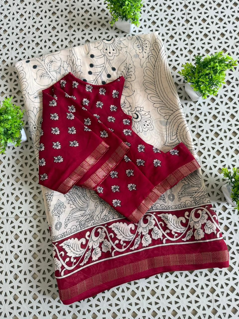 Kalamkari printed cream color saree with contrast red blouse and zari border