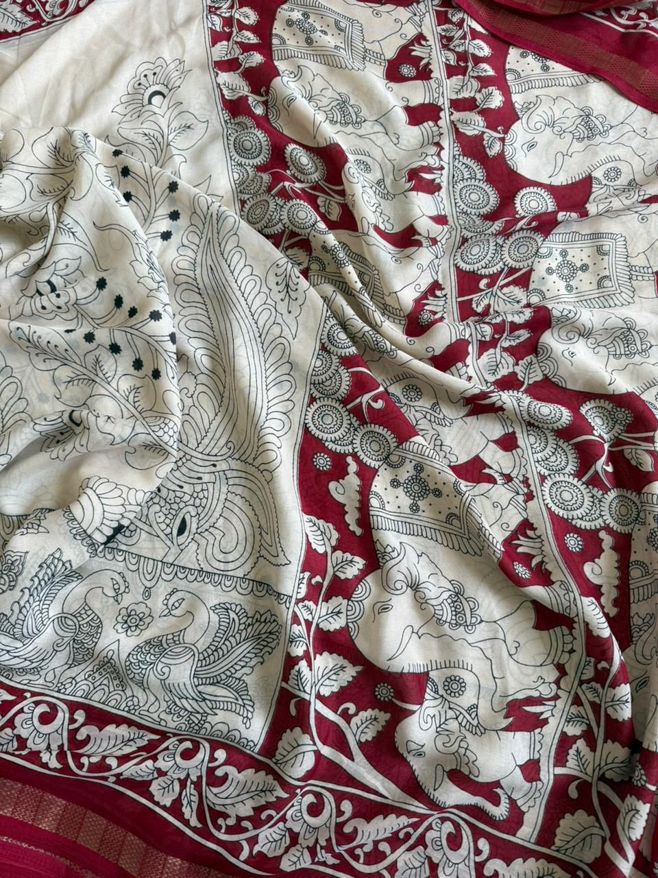 Soft marshmallow fabric cream color saree with traditional Kalamkari motifs and pallu design
