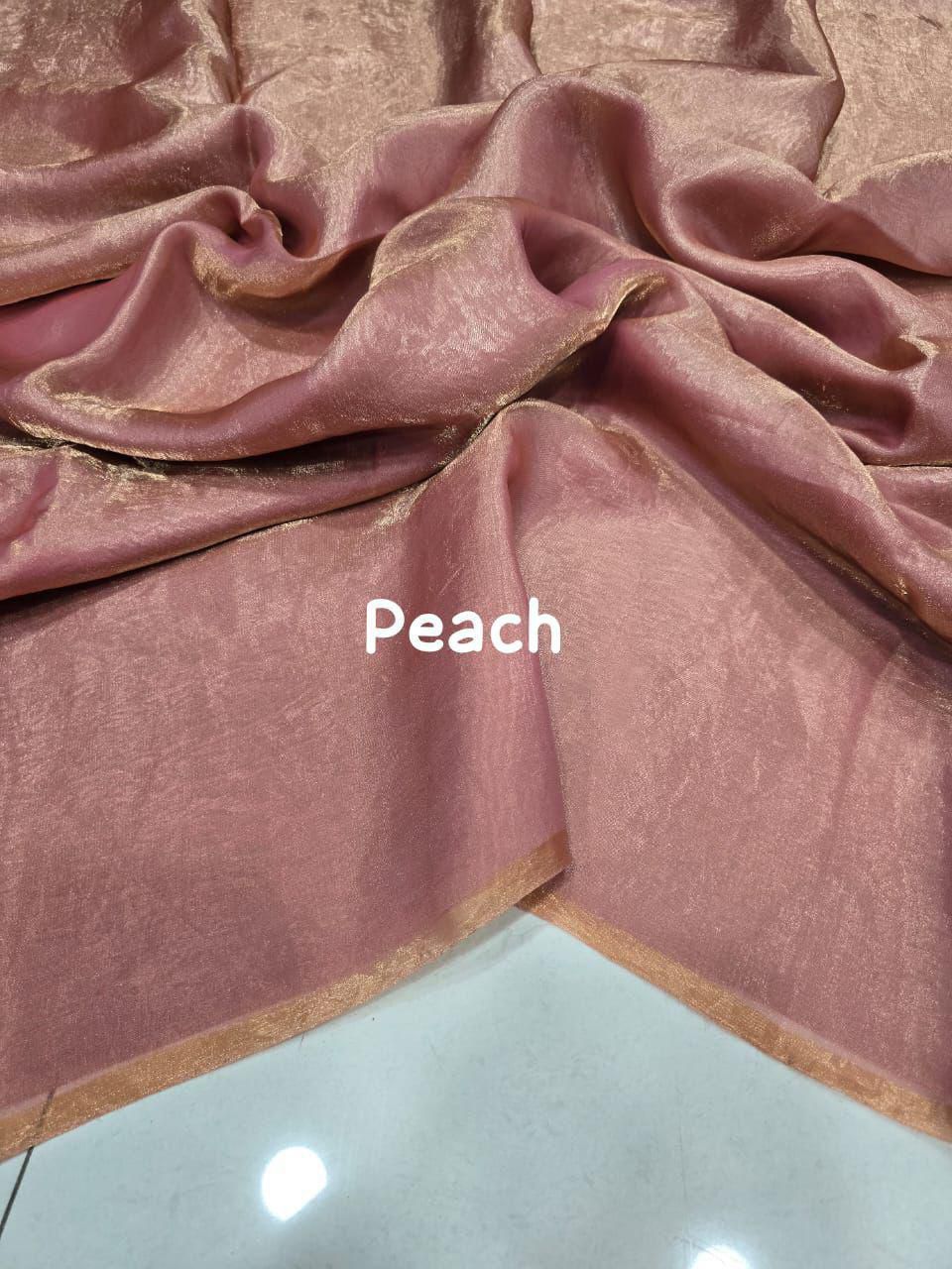 Close-up of peach color fabric with 'Peach' text