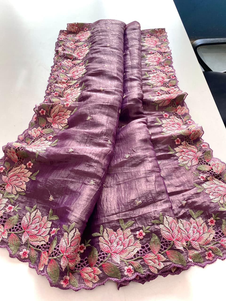 Purple saree with floral patterns