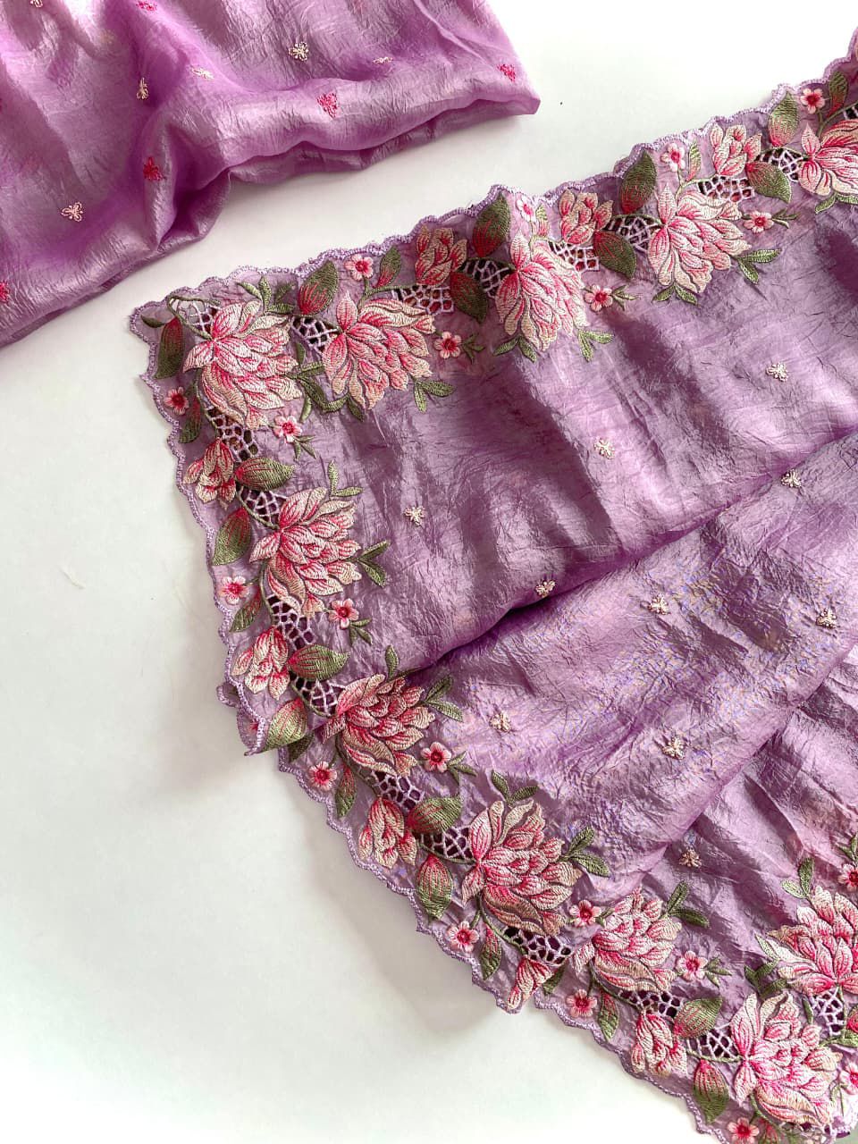 lavender fabric with floral embroidery