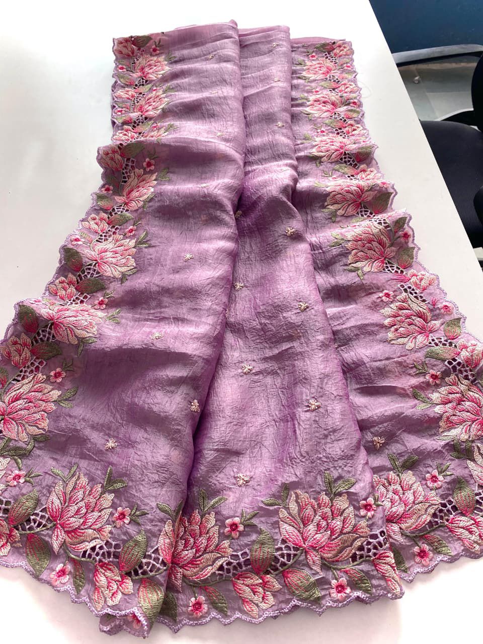 lavender fabric with floral embroidery