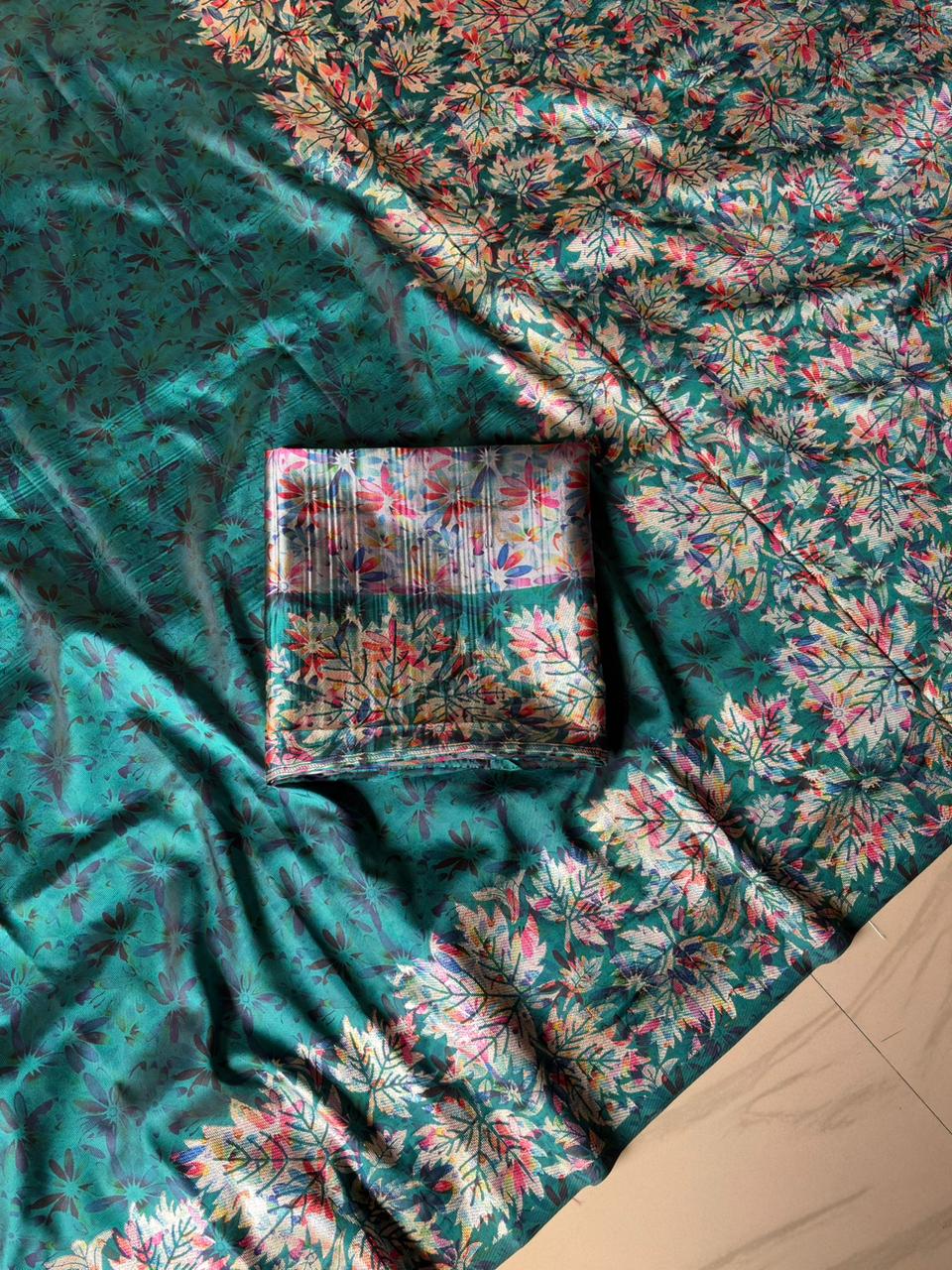 Rama Green fabric with floral patterns 