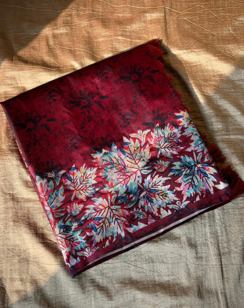 Maroon fabric with floral patterns 