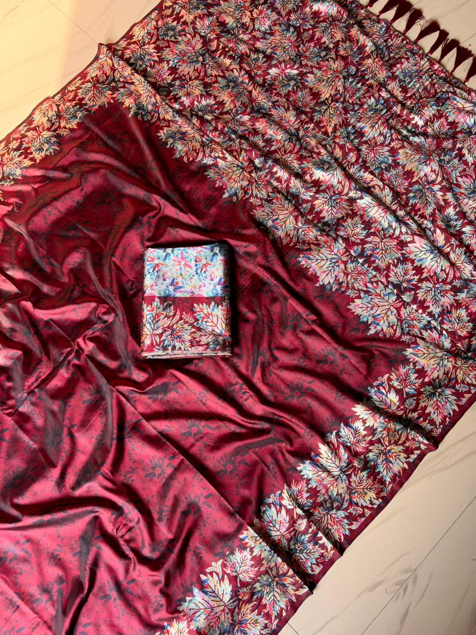Maroon fabric with floral patterns 