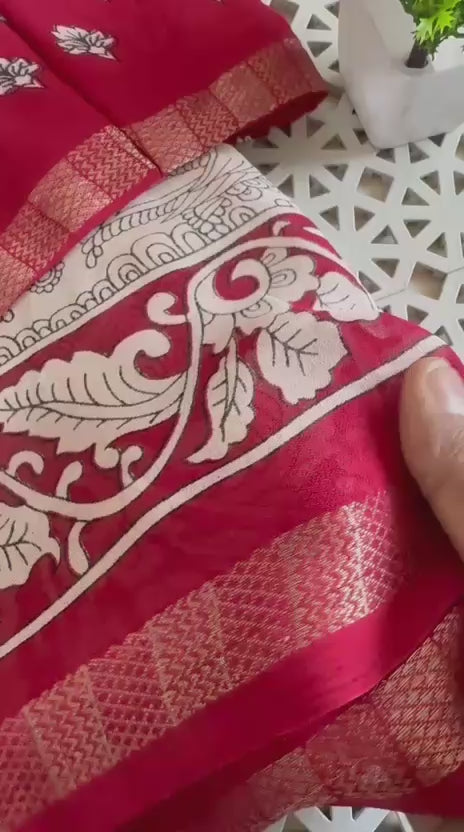 cream color saree and red blouse