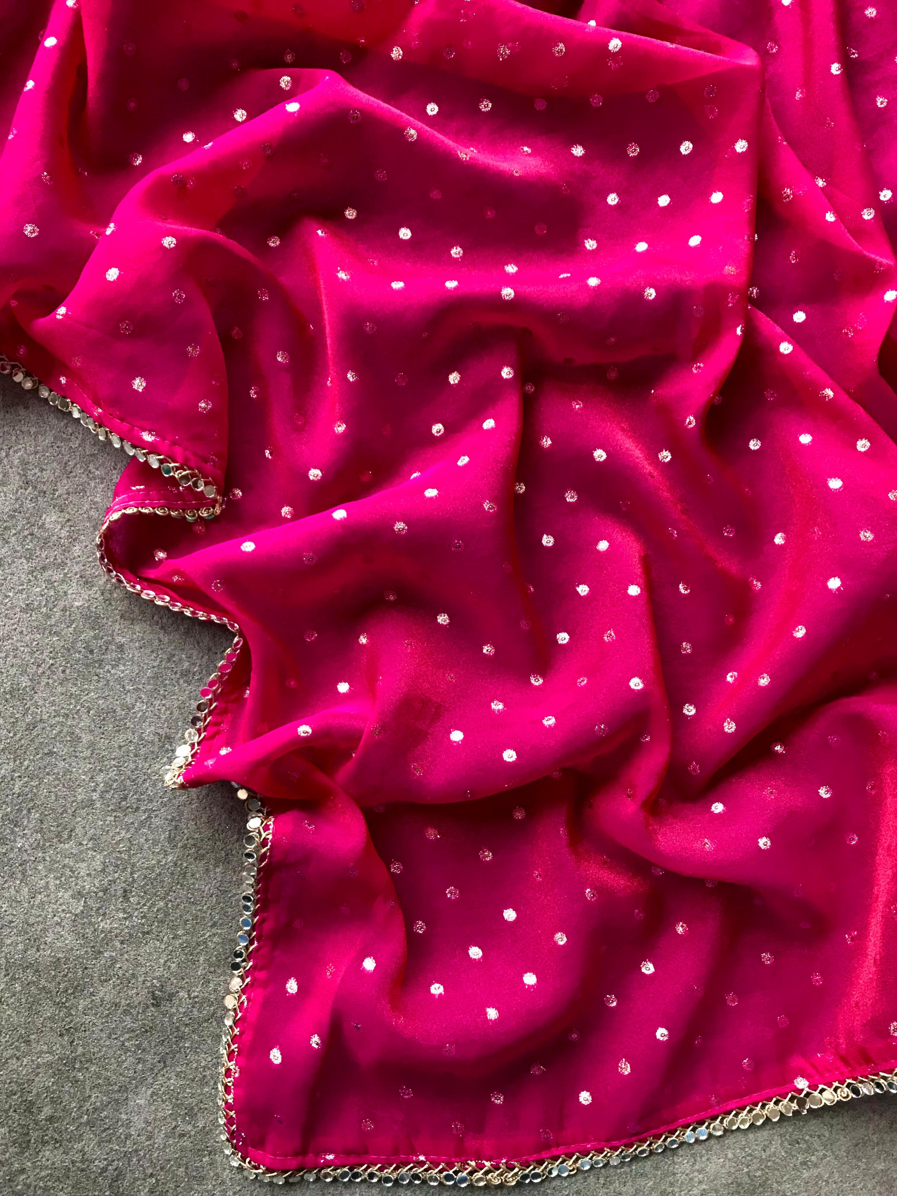 Pink fabric with polka dots