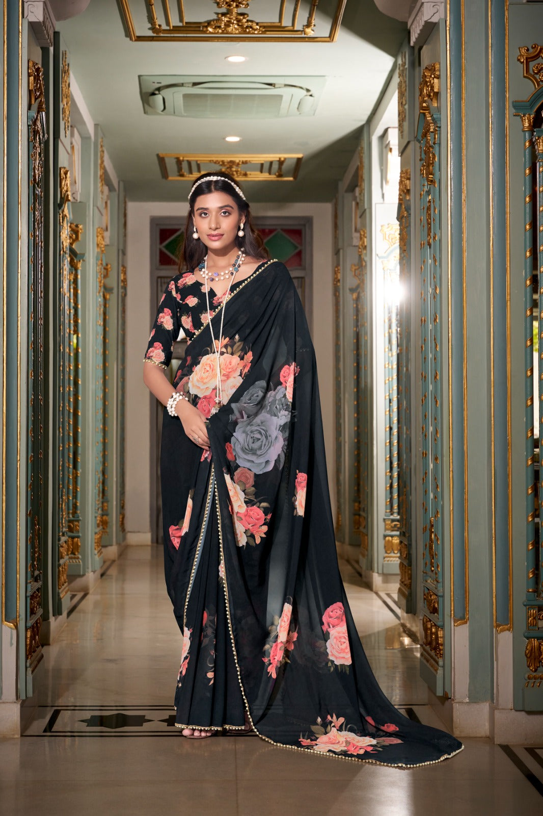 black saree with floral patterns 
