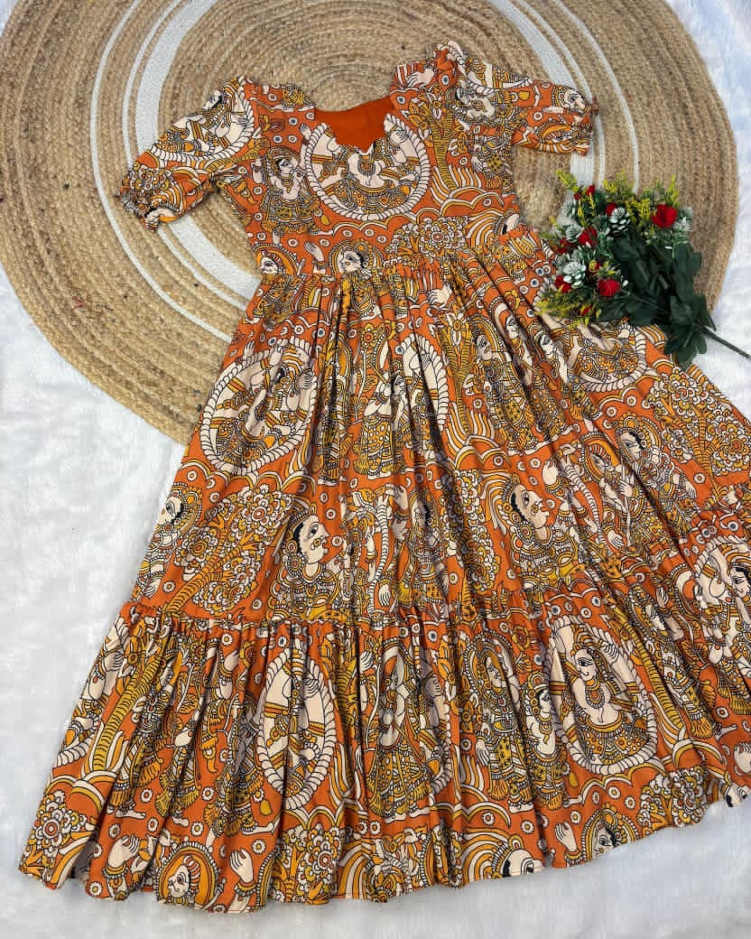 Orange frock with intricate designs 