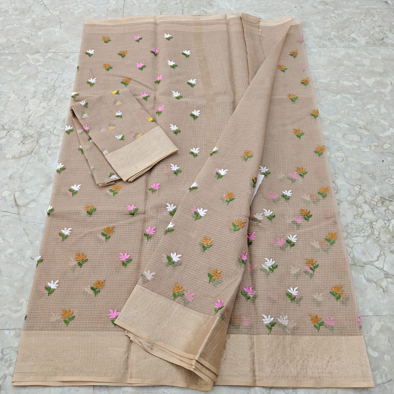 Beige fabric with floral patterns 