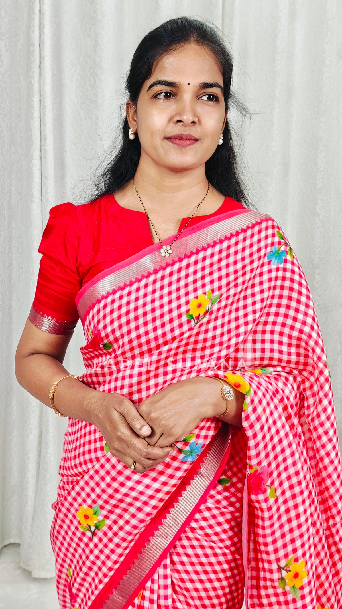 Pink colour Mangalagiri checks and floral saree