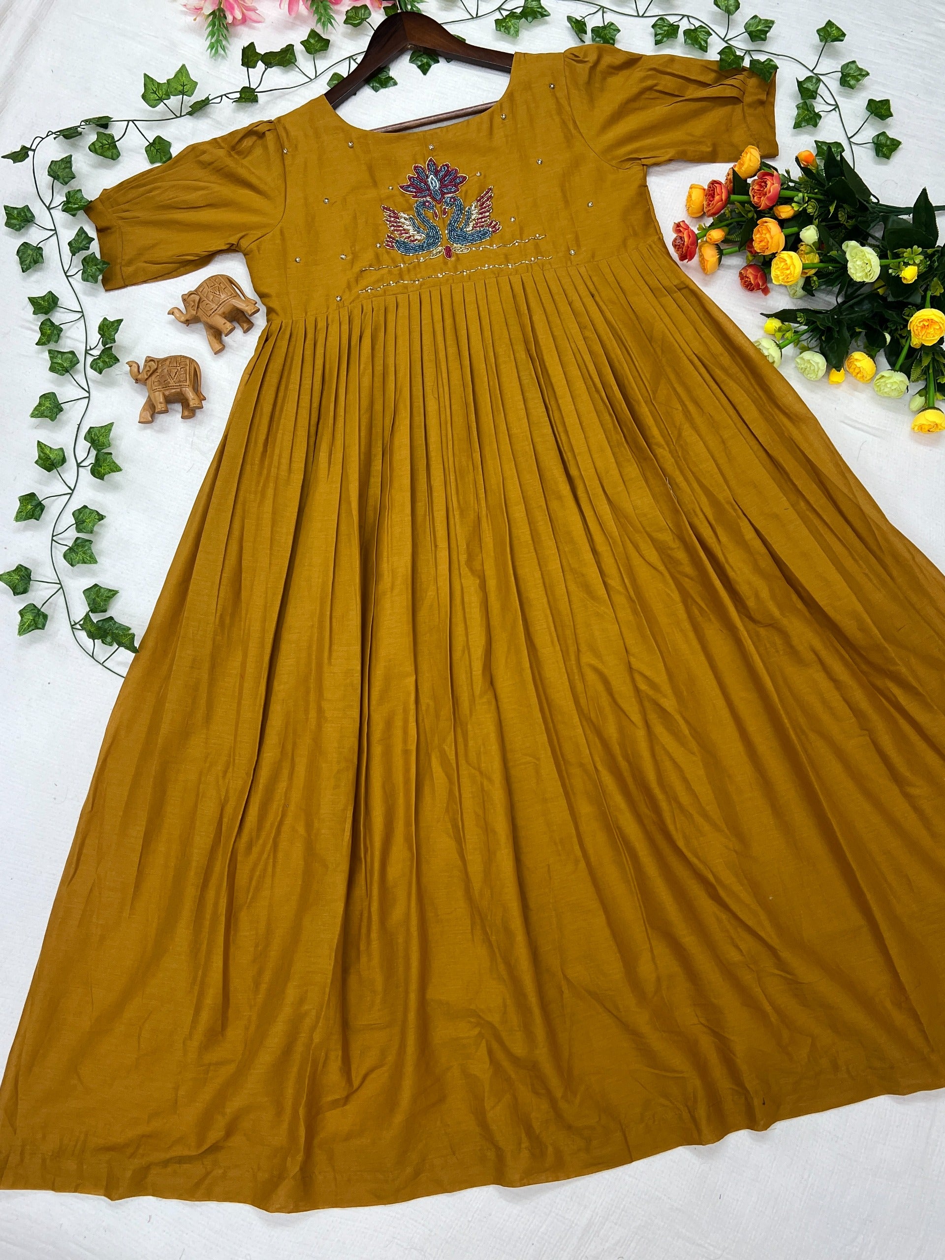 Mustard yellow dress with floral embroidery work 