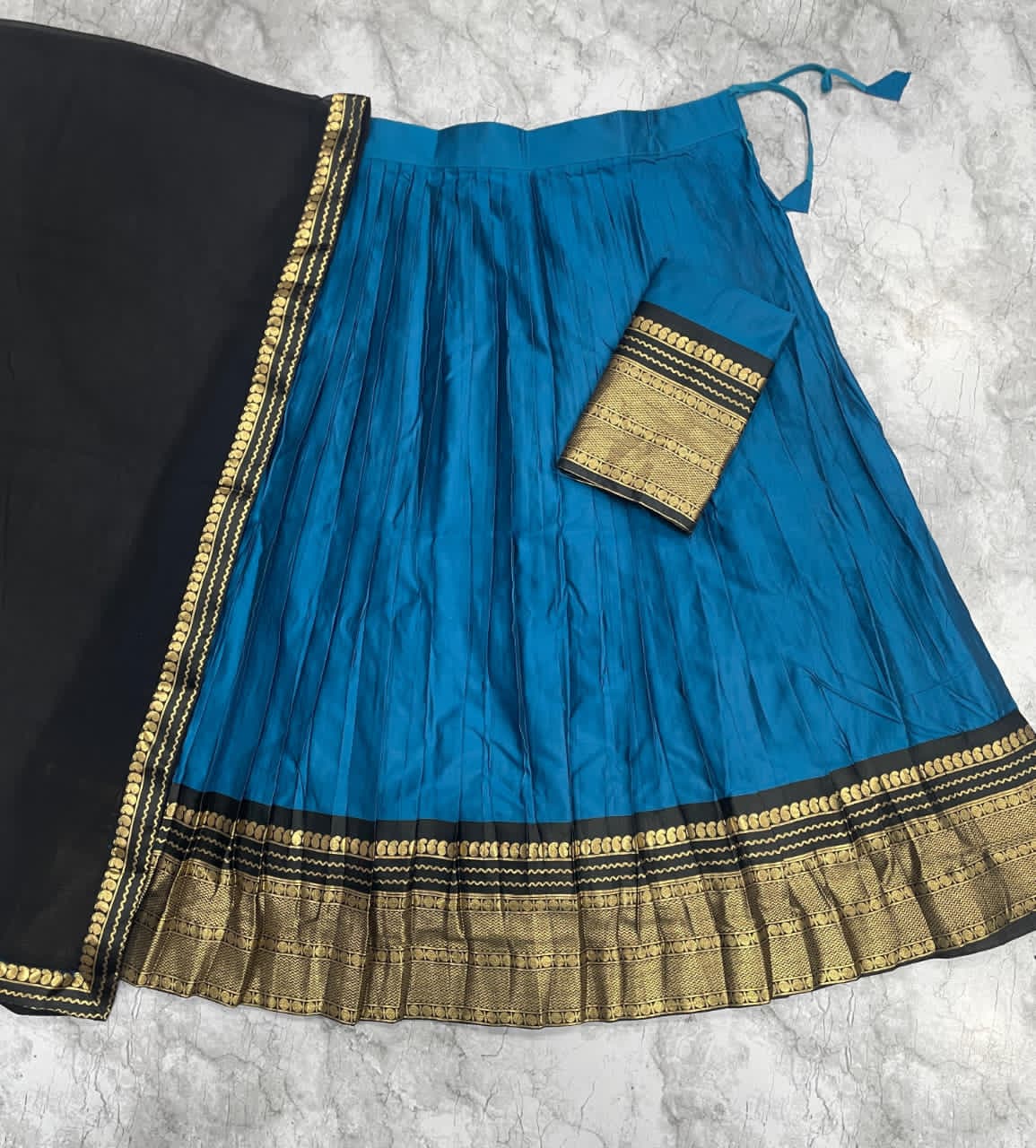 Blue fabric with gold border 