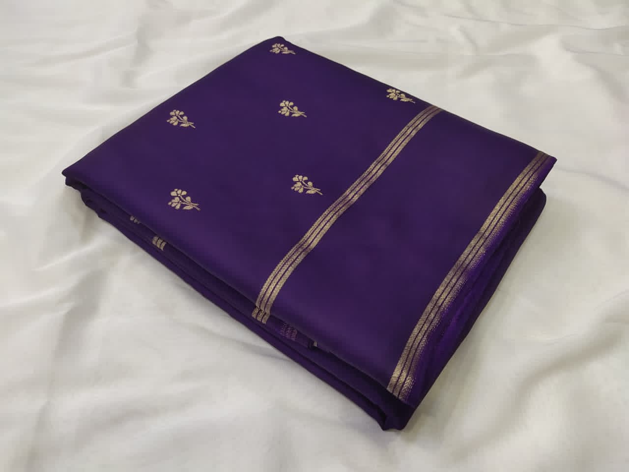 purple fabric with embroidery work 
