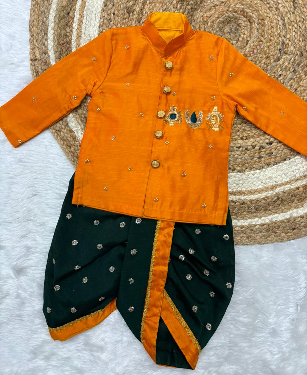 Traditional outfit with orange jacket and bottle green dhoti