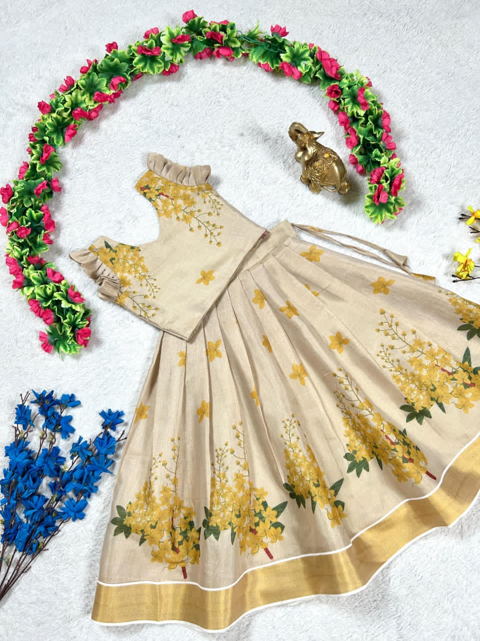 Beige lehanga with gold floral patterns 