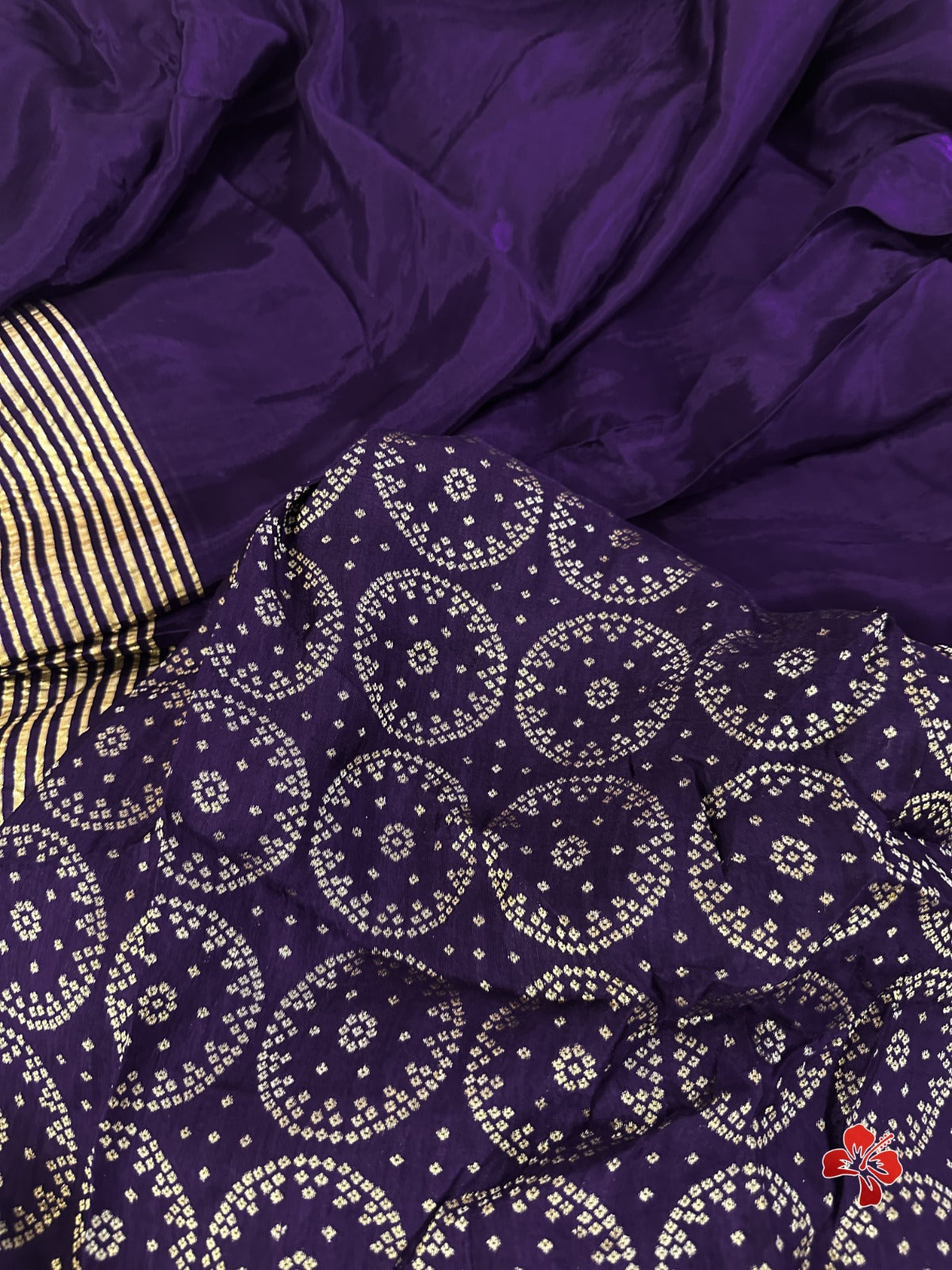 Purple saree with floral patterns