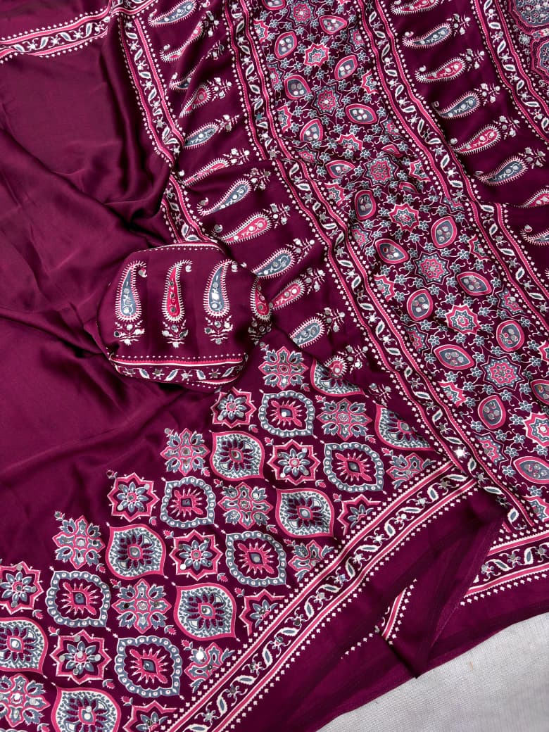 Wine colour saree with floral patterns 