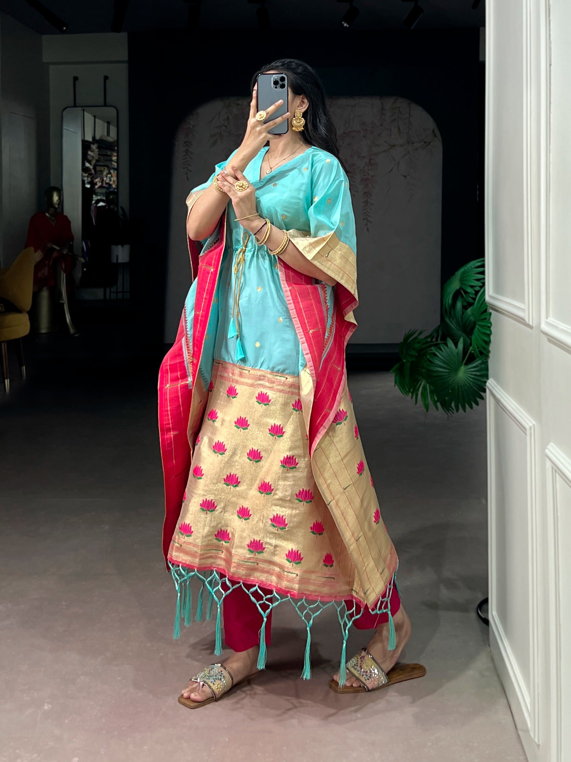 traditional sky blue outfit with floral patterns 