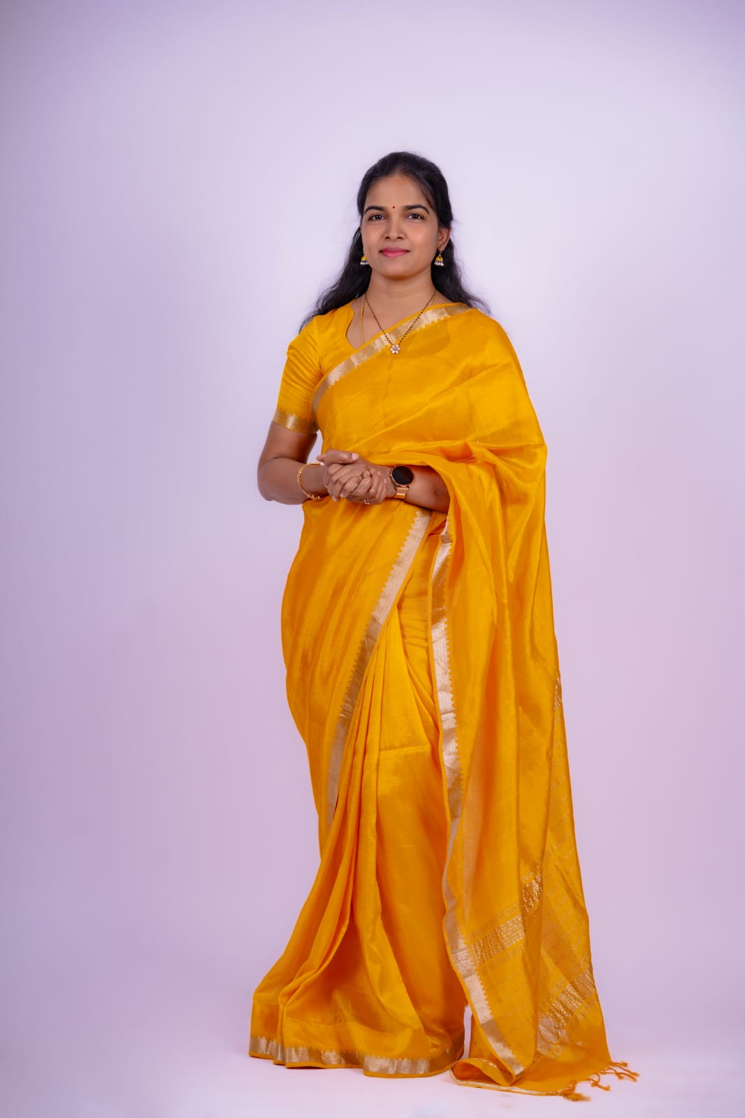A yellow Mangalagiri Handloom pattu saree 