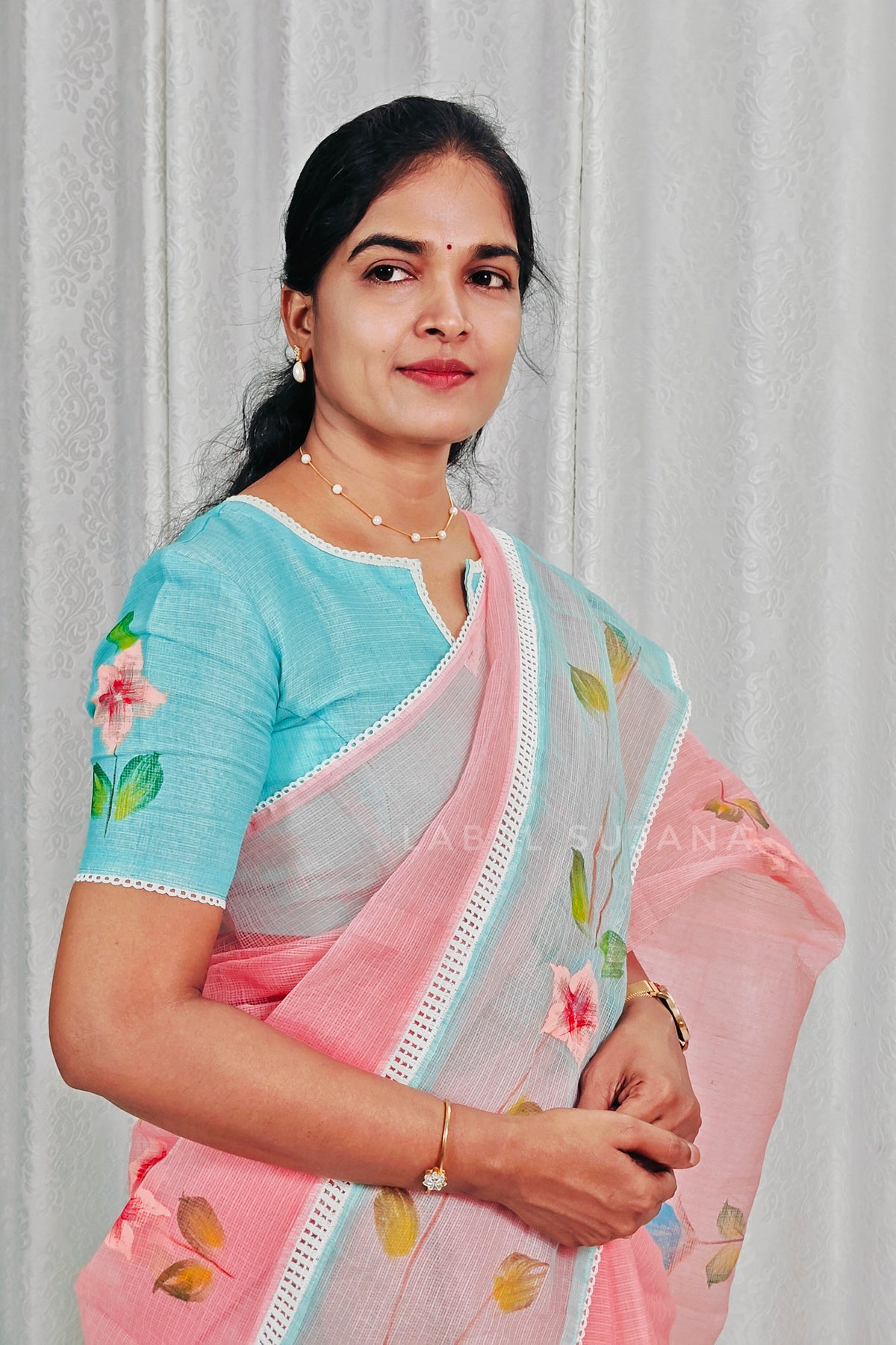 A Peach colour Brush Painted Kota Saree