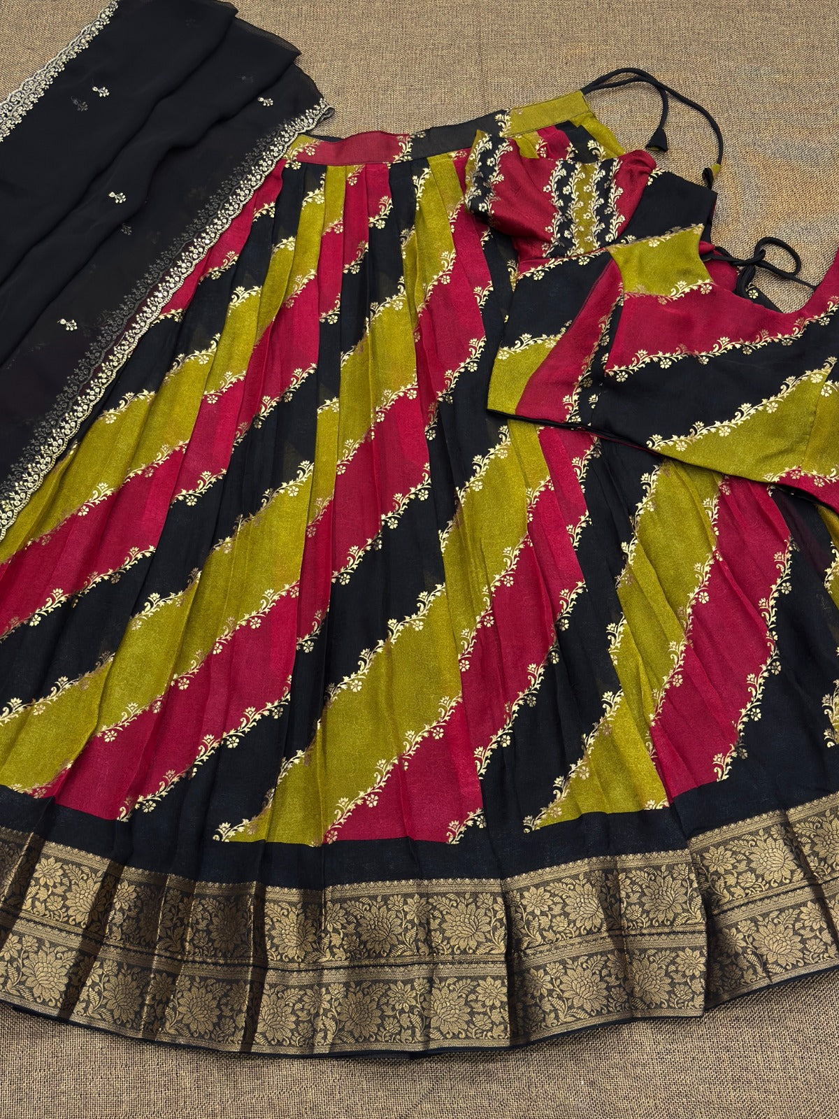  Multicolor saree with pattern on a beige surface