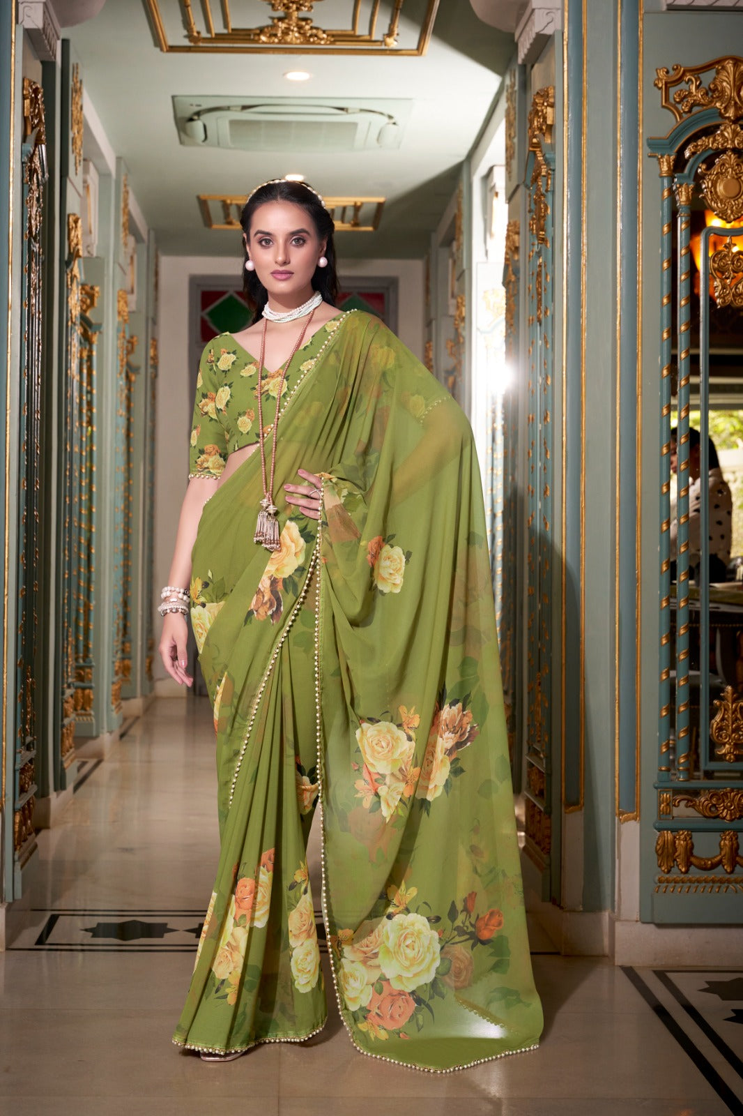 Parrot green saree with floral patterns 
