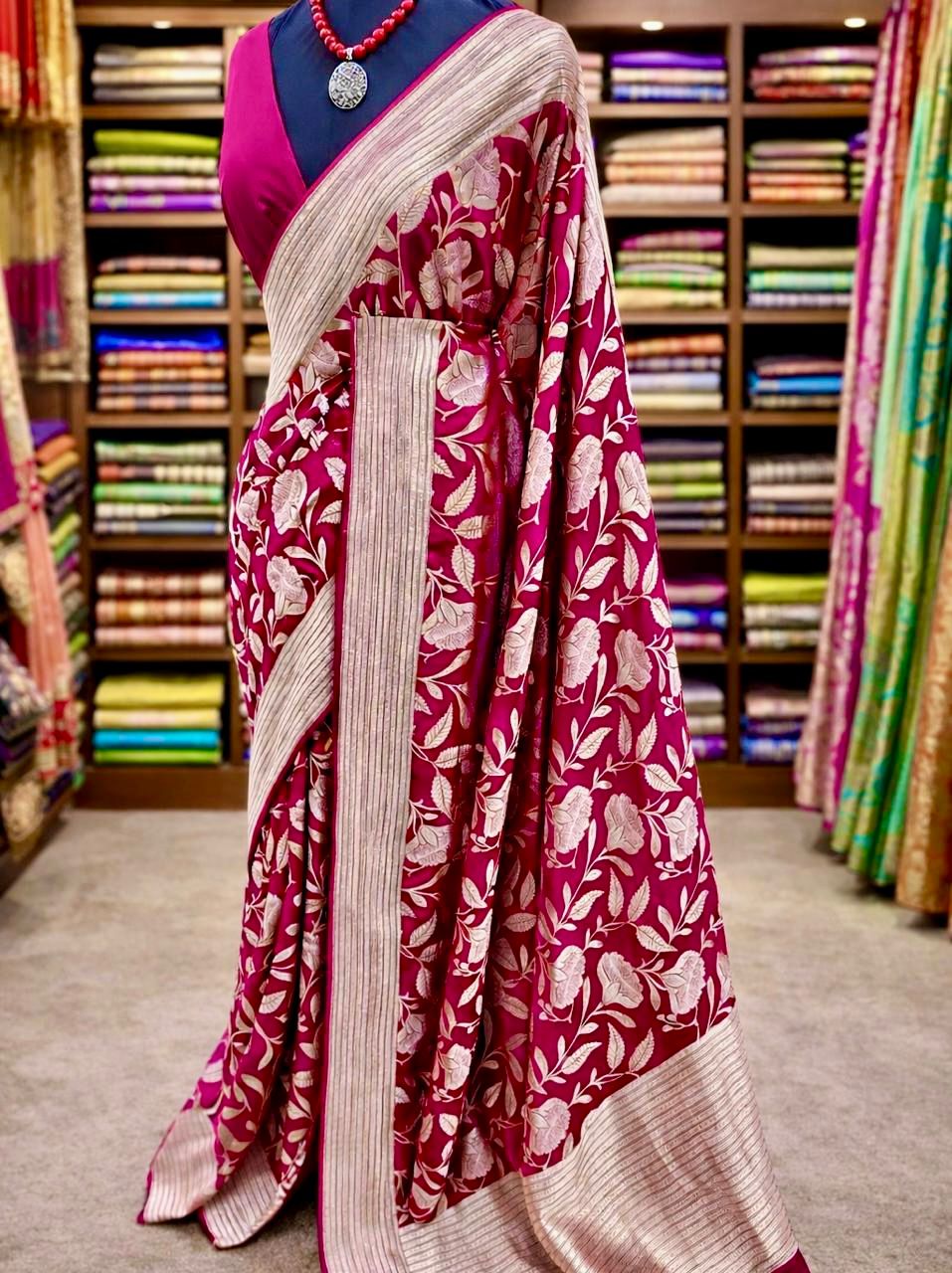Wine Saree and white pattern in a store setting