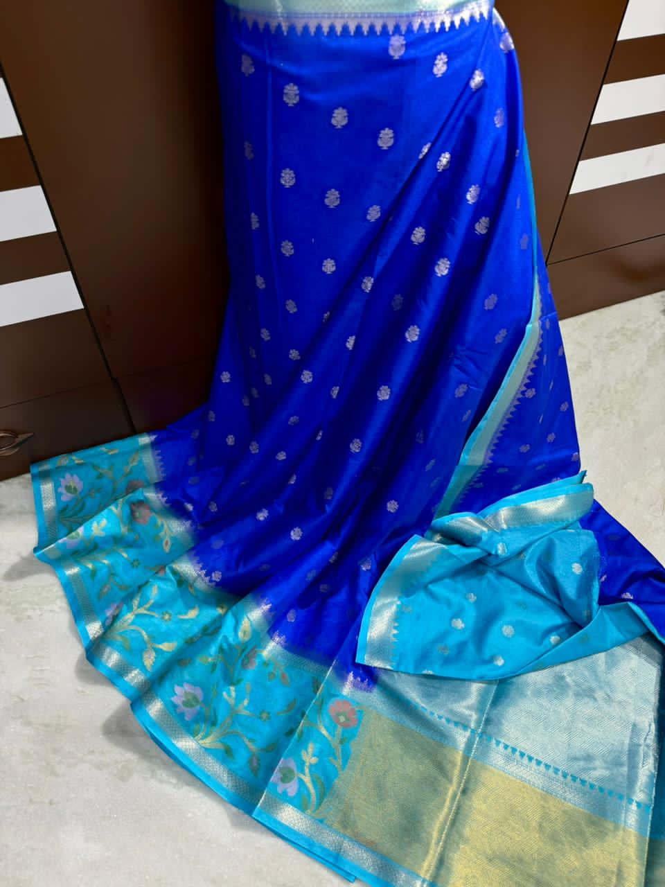 Royal blue saree with floral patterns 