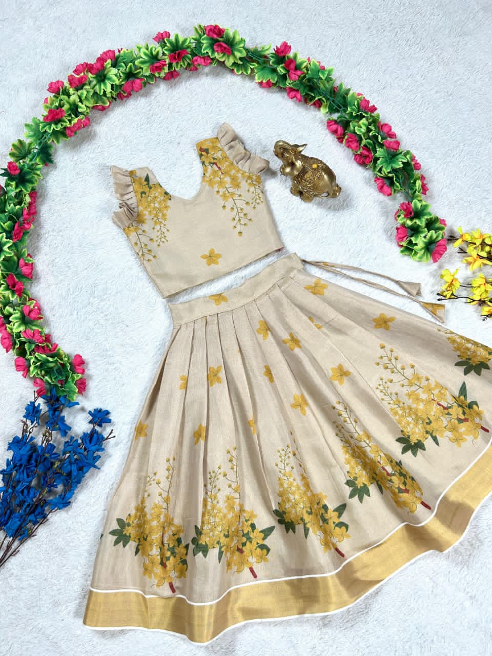 Beige lehanga with gold floral patterns