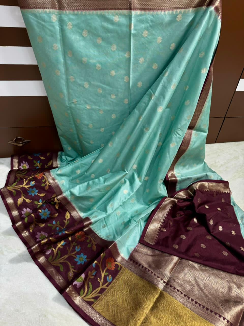 Turquoise Blue saree with floral patterns 