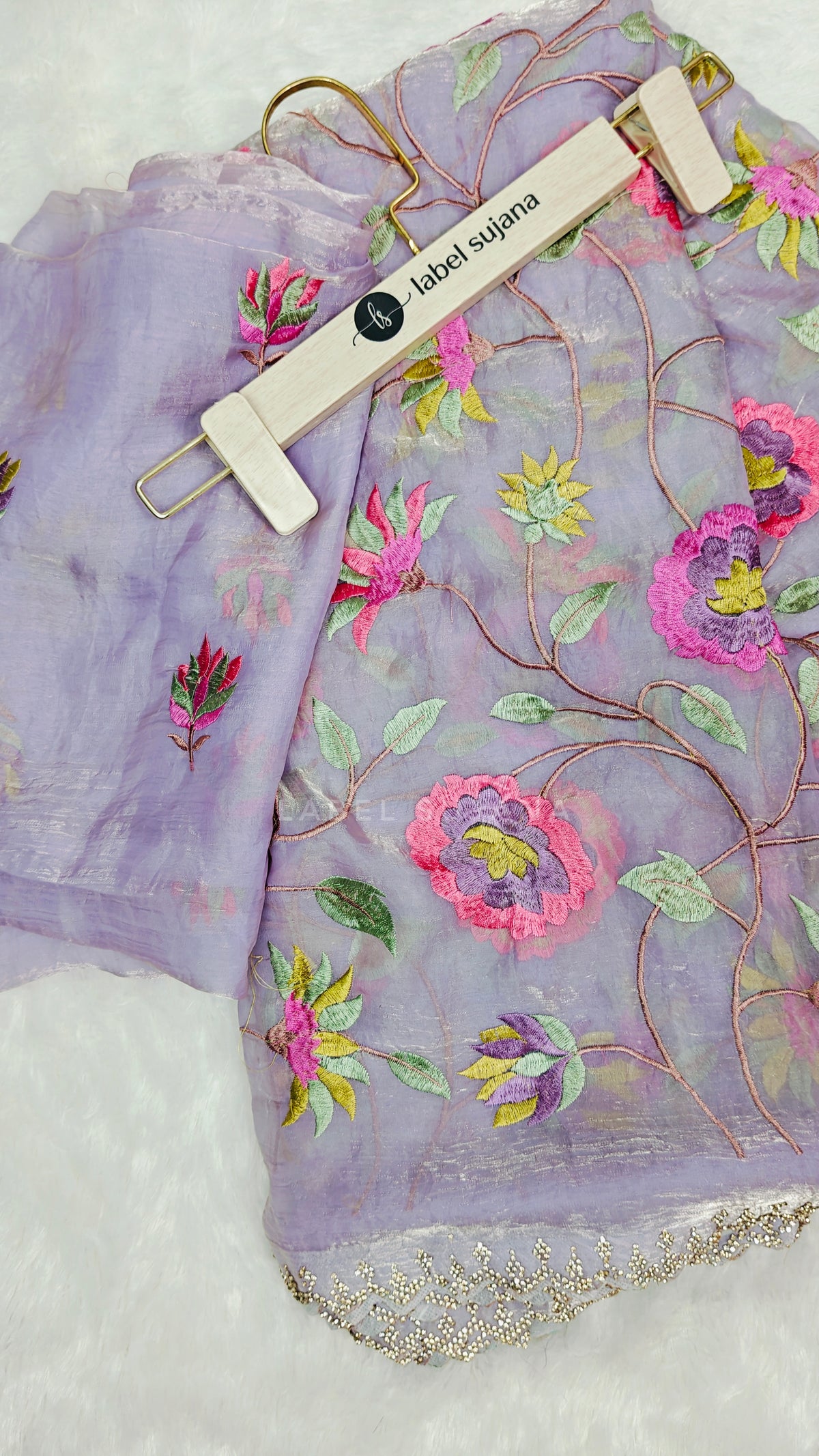 A Lavender embroidery saree with matching blouse 