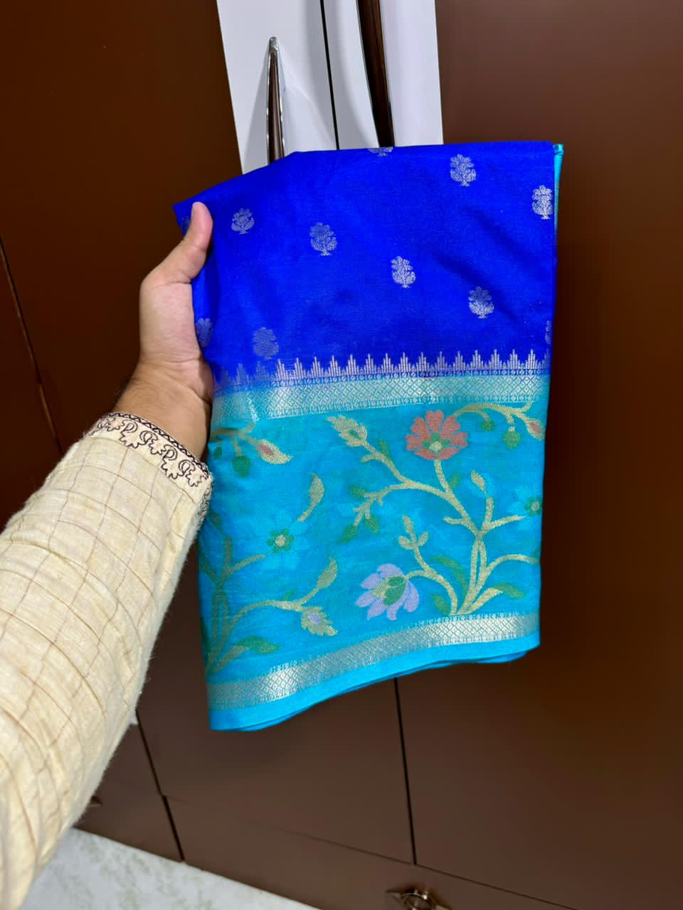 Royal blue lue saree with floral patterns and design 