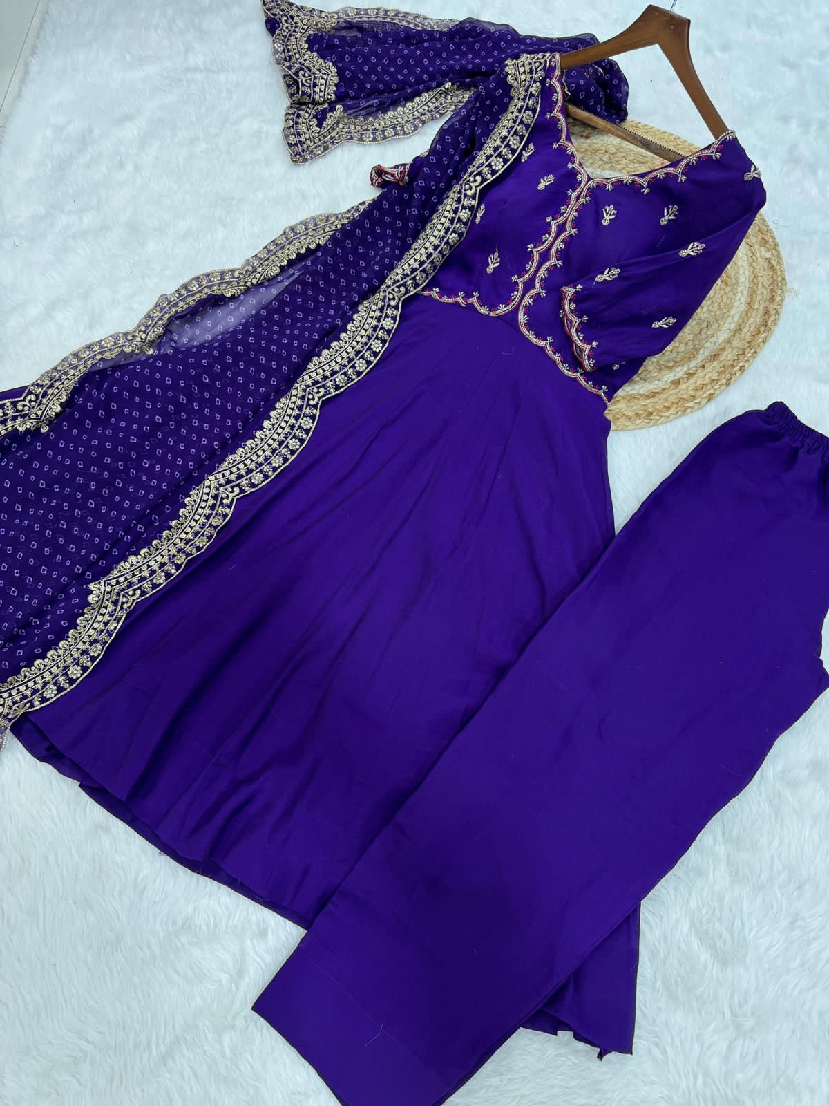 Purple traditional outfit with embroidered details 