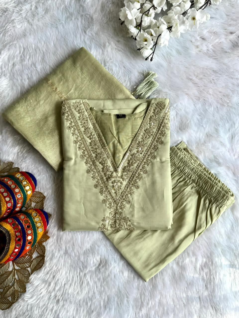 Light green traditional outfit with embroidery work 