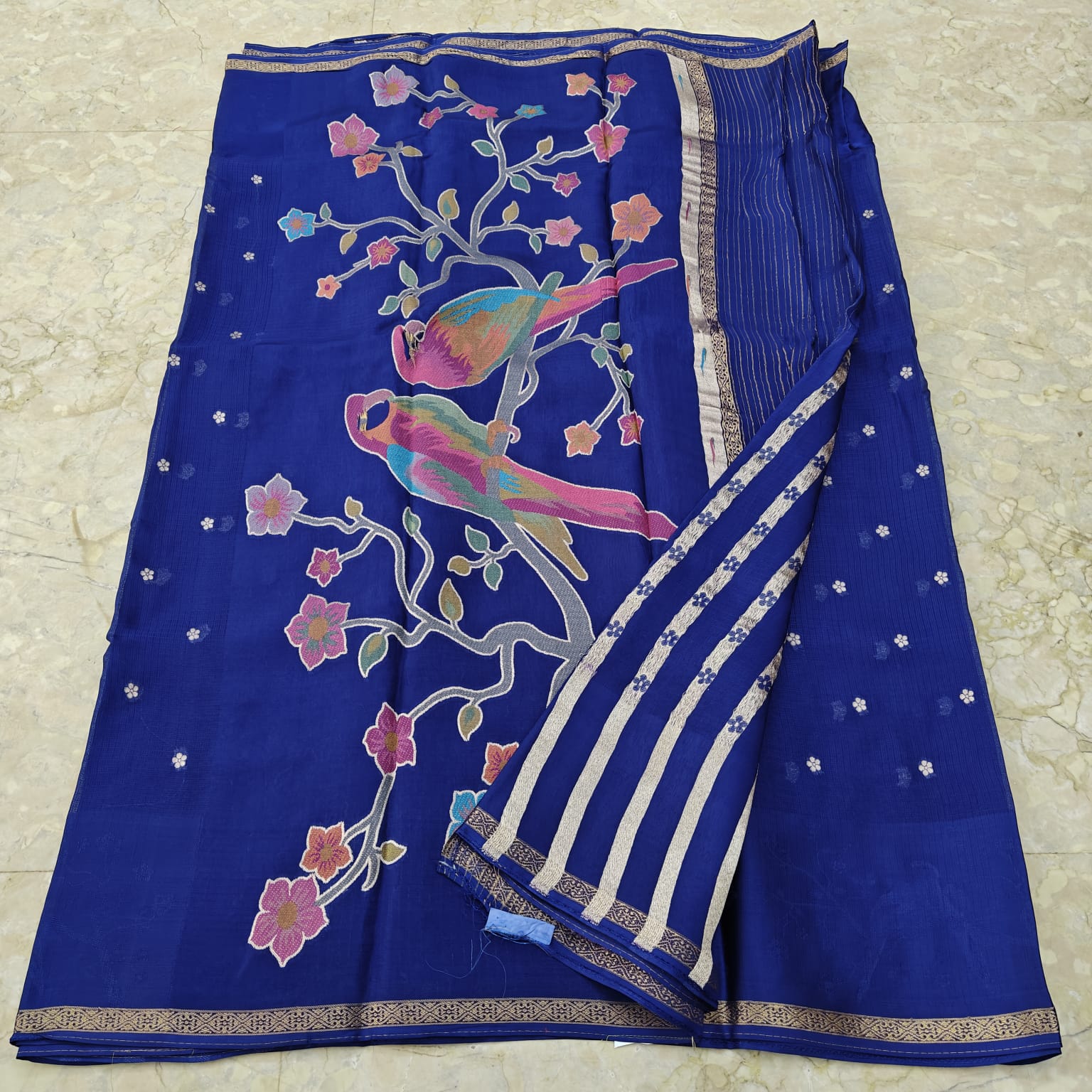 Royal Blue saree with bird and floral  patterns 
