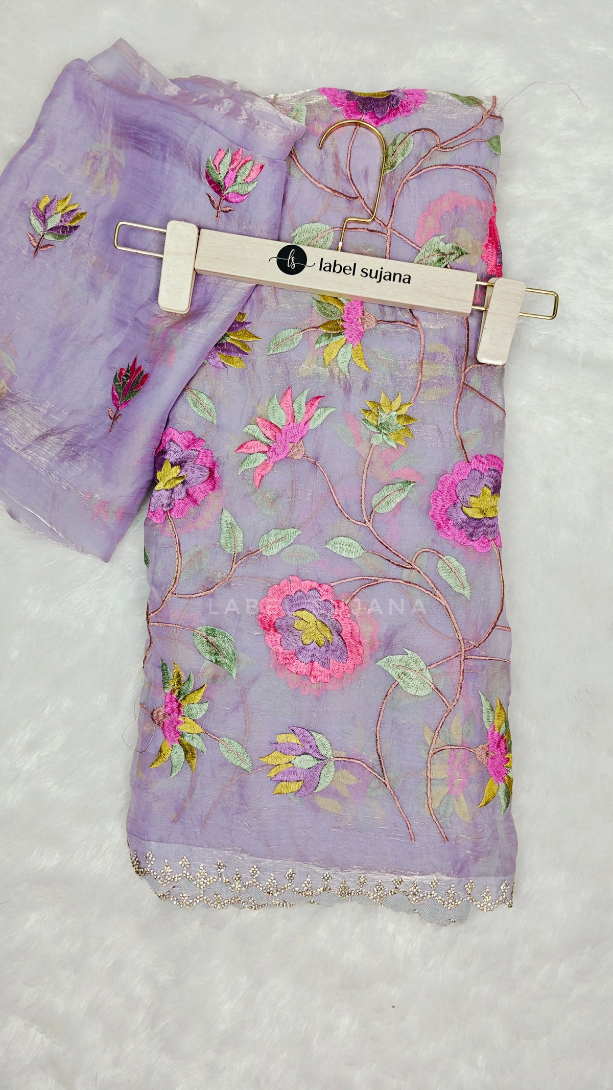 A Lavender embroidery saree with matching blouse 