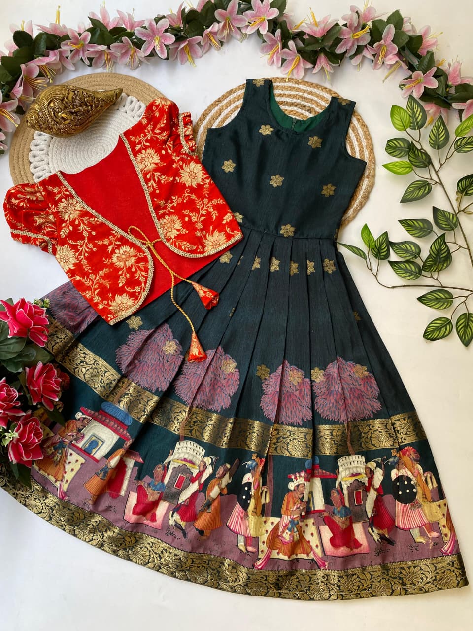 Dark green Traditional embroidered dress with intricate patterns on a decorative background with flowers and leaves.