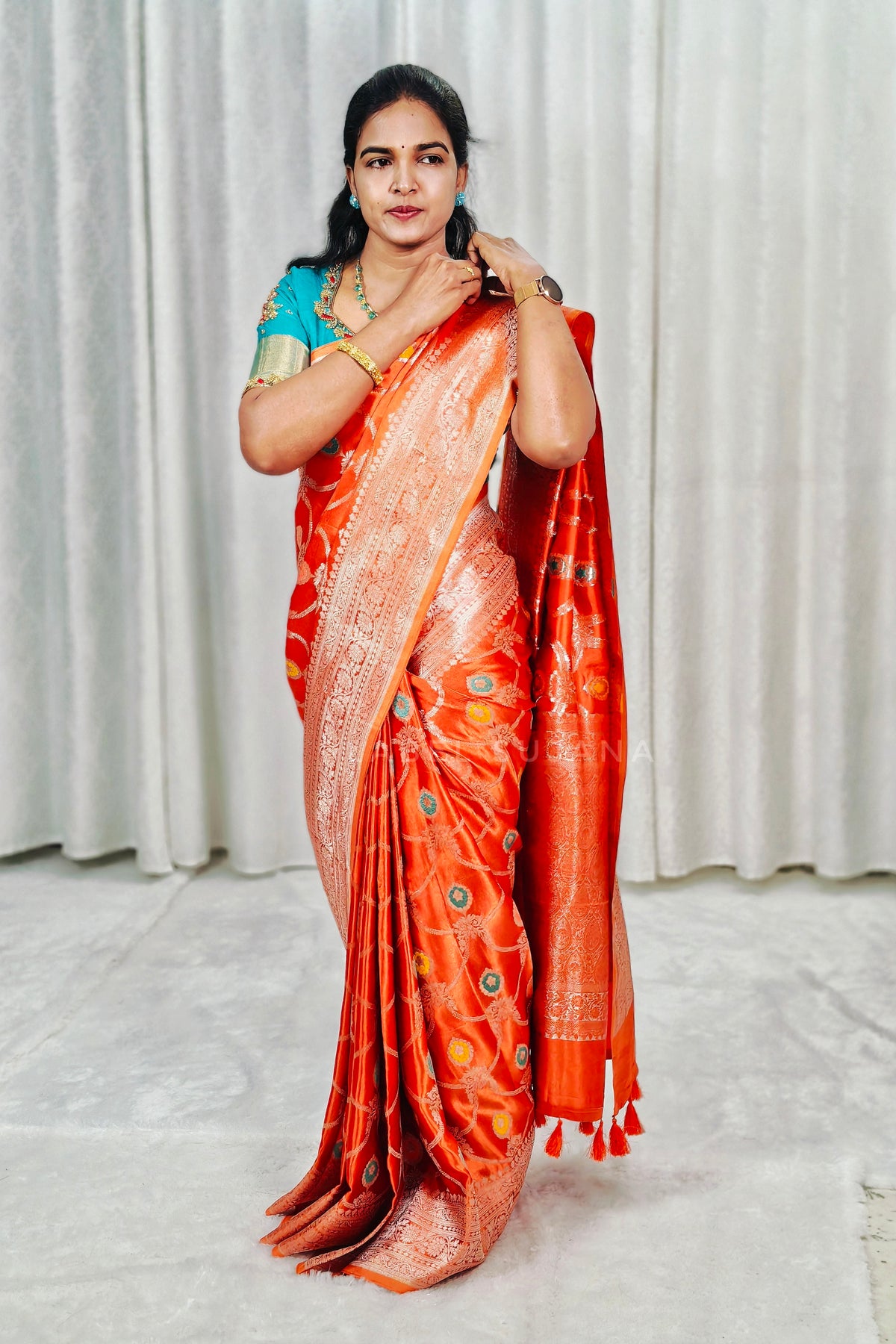 A Rust Orange Silk Saree