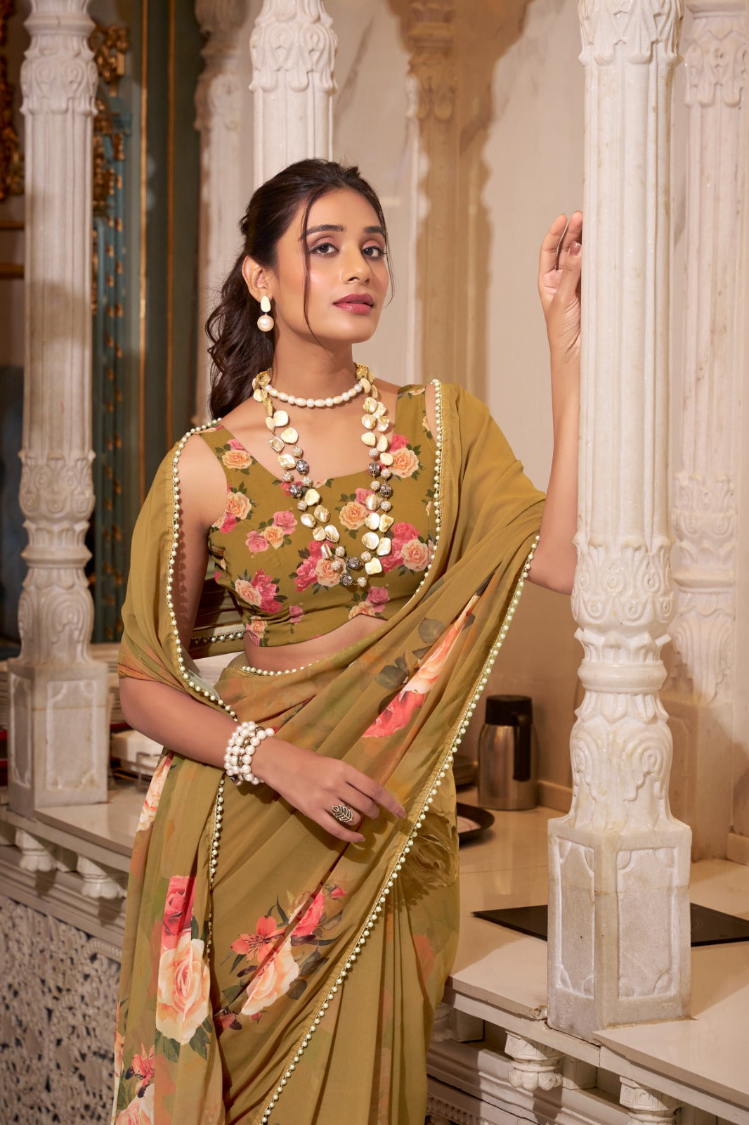 Olive Green saree with floral patterns 