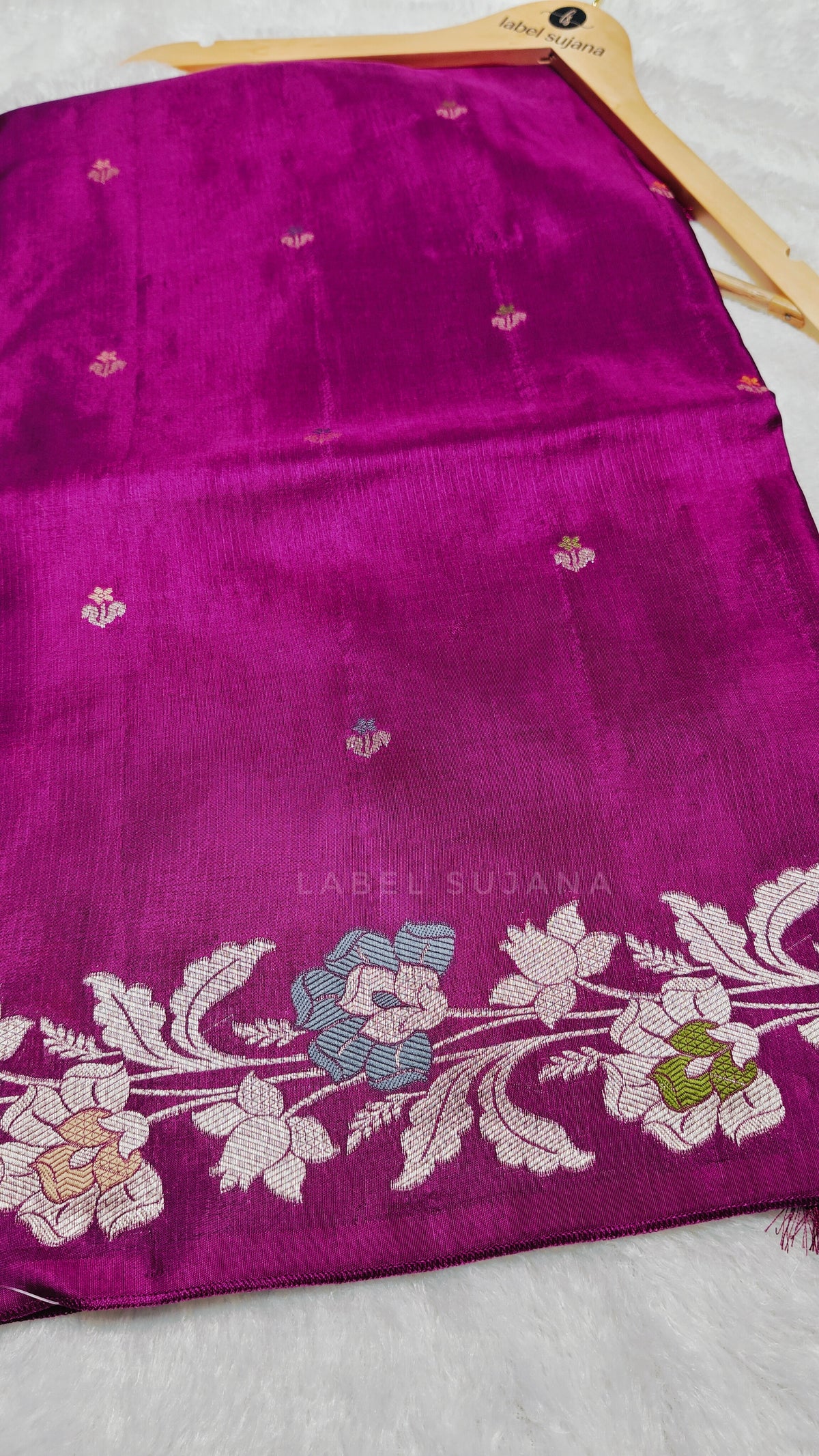 A magenta silk saree