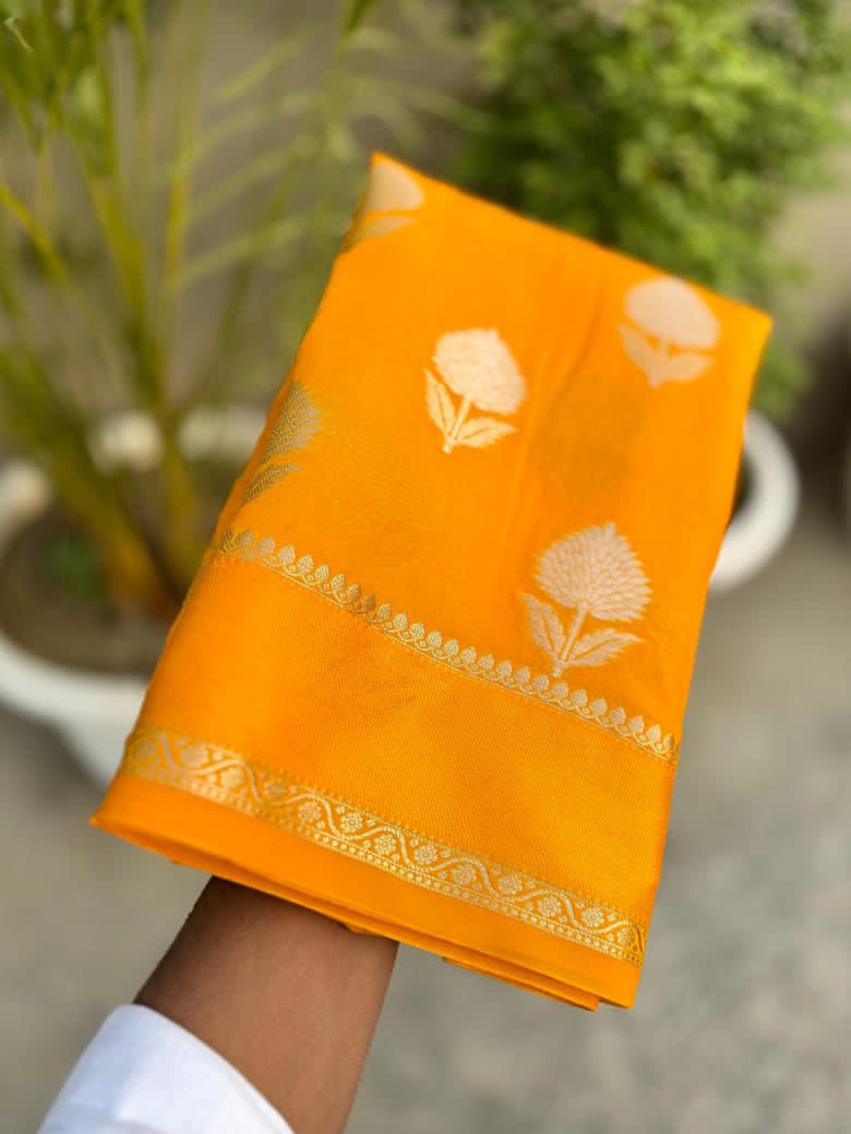 Yellow fabric with floral patterns