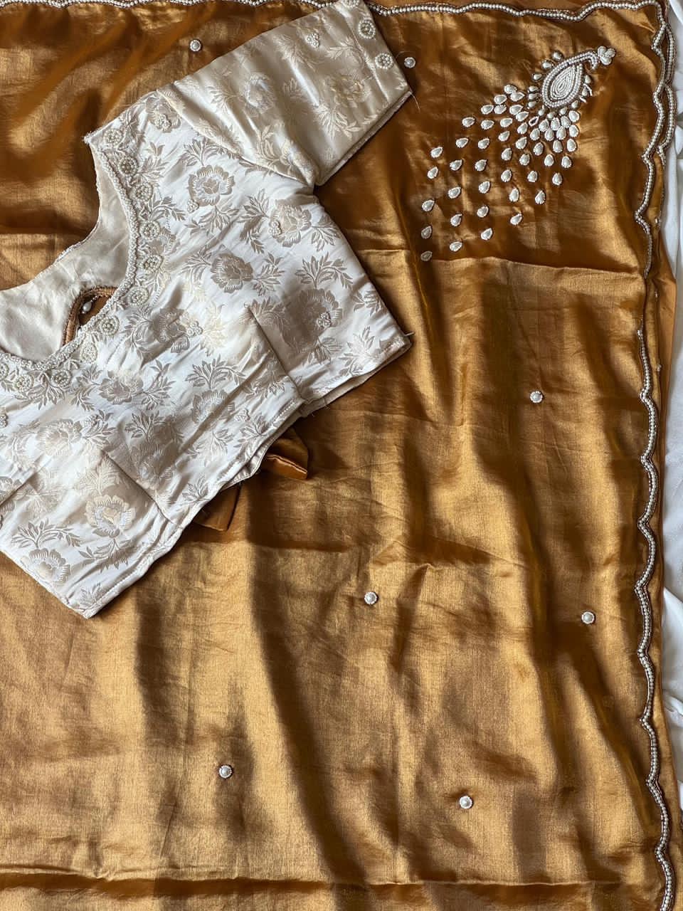 Gold saree with cream blouse 