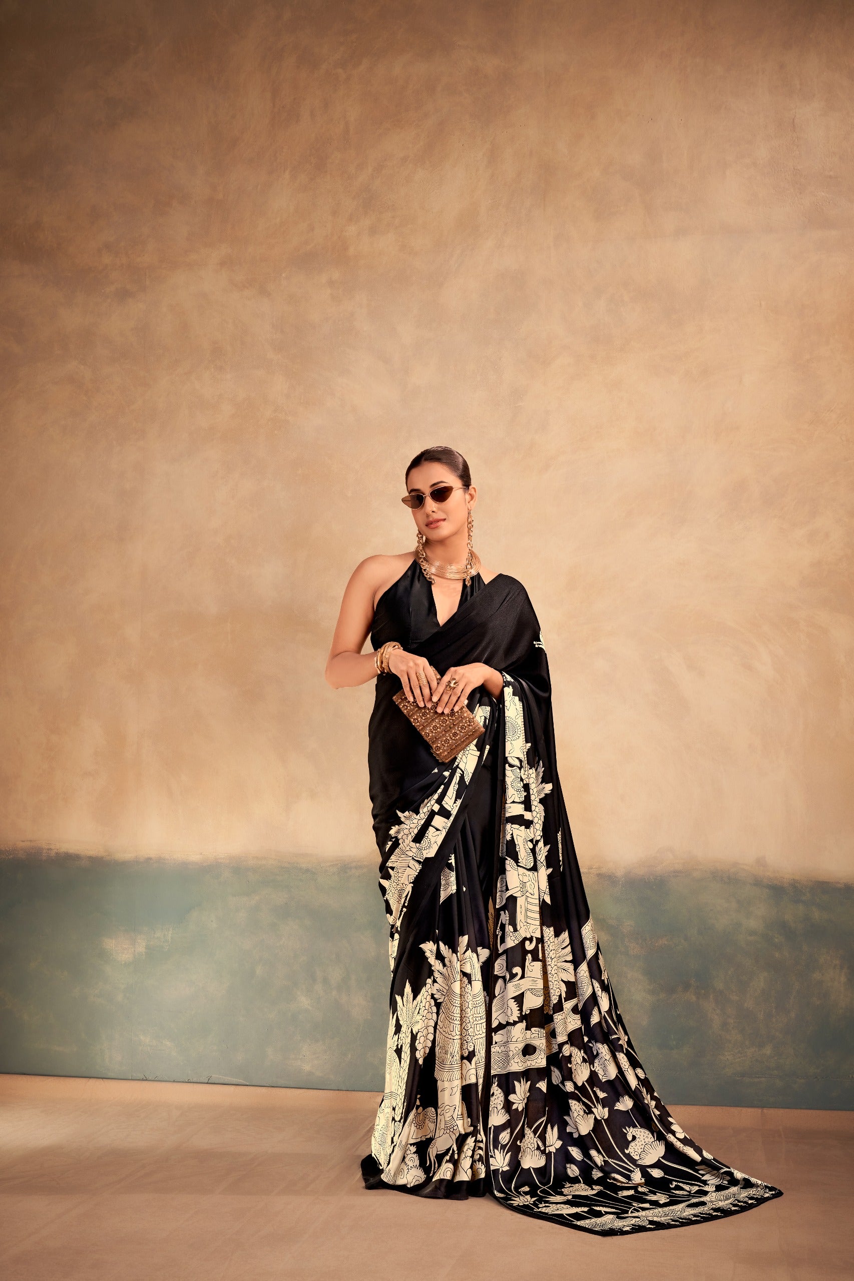 black saree with white floral pattern 