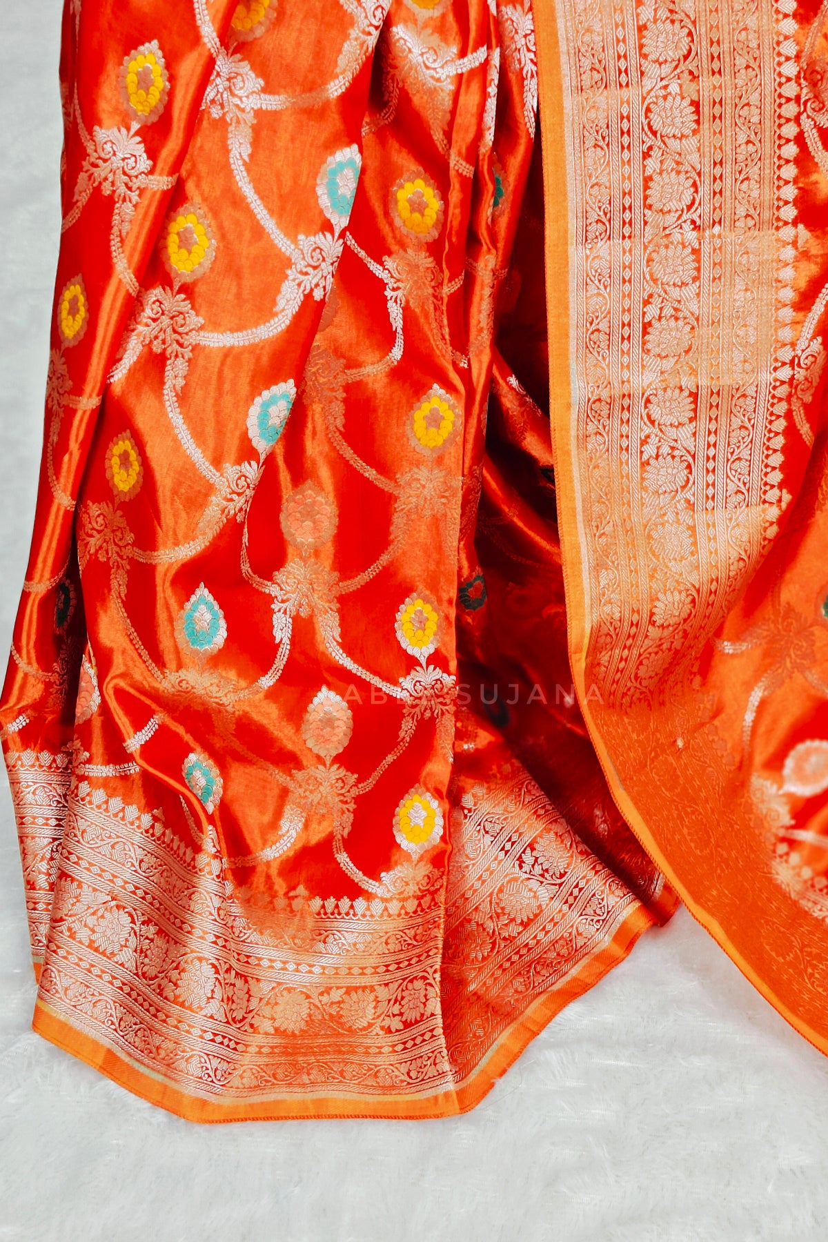 A Rust Orange Silk Saree