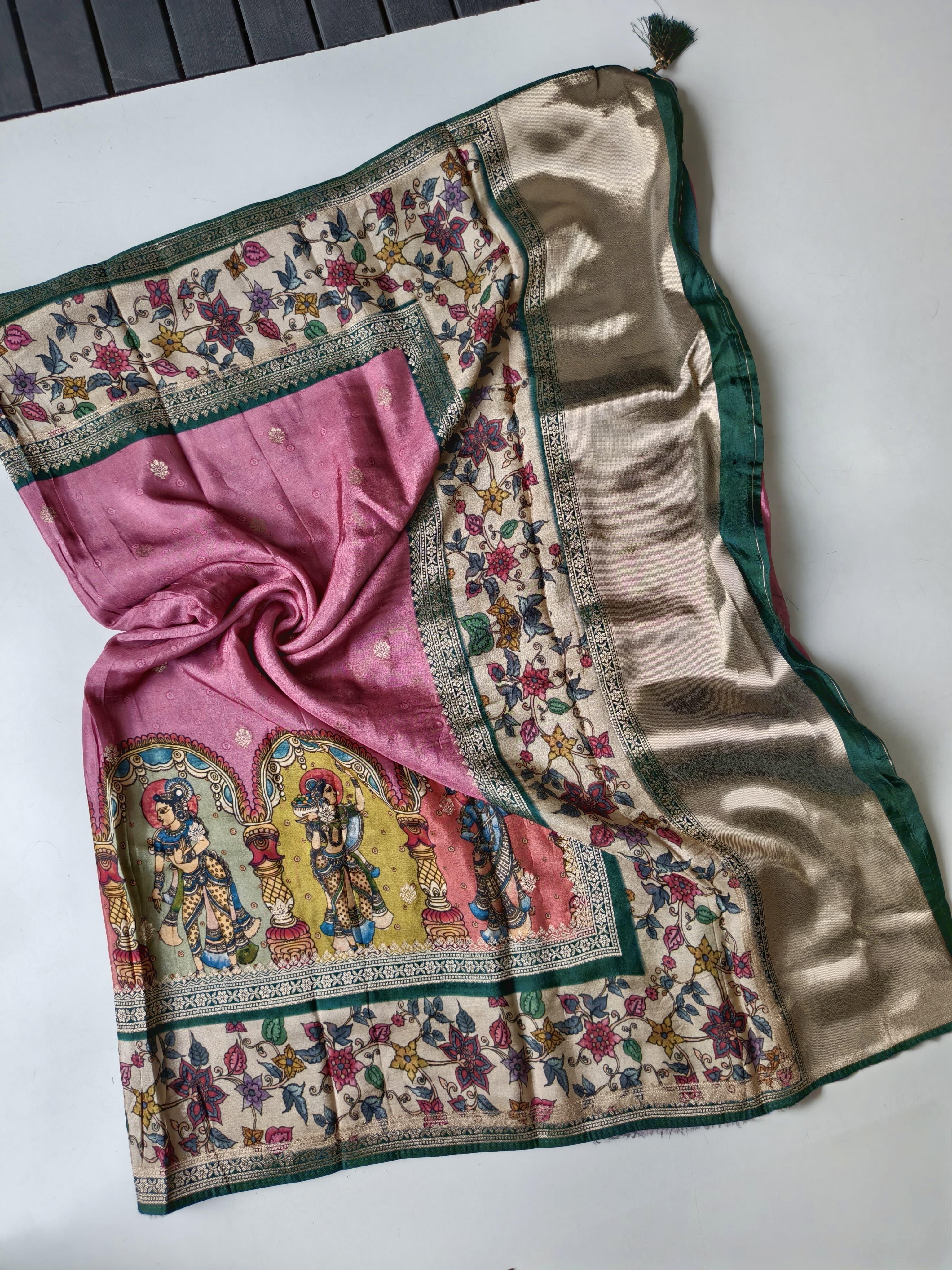 Onion pink traditional saree with intricate patterns on a white background