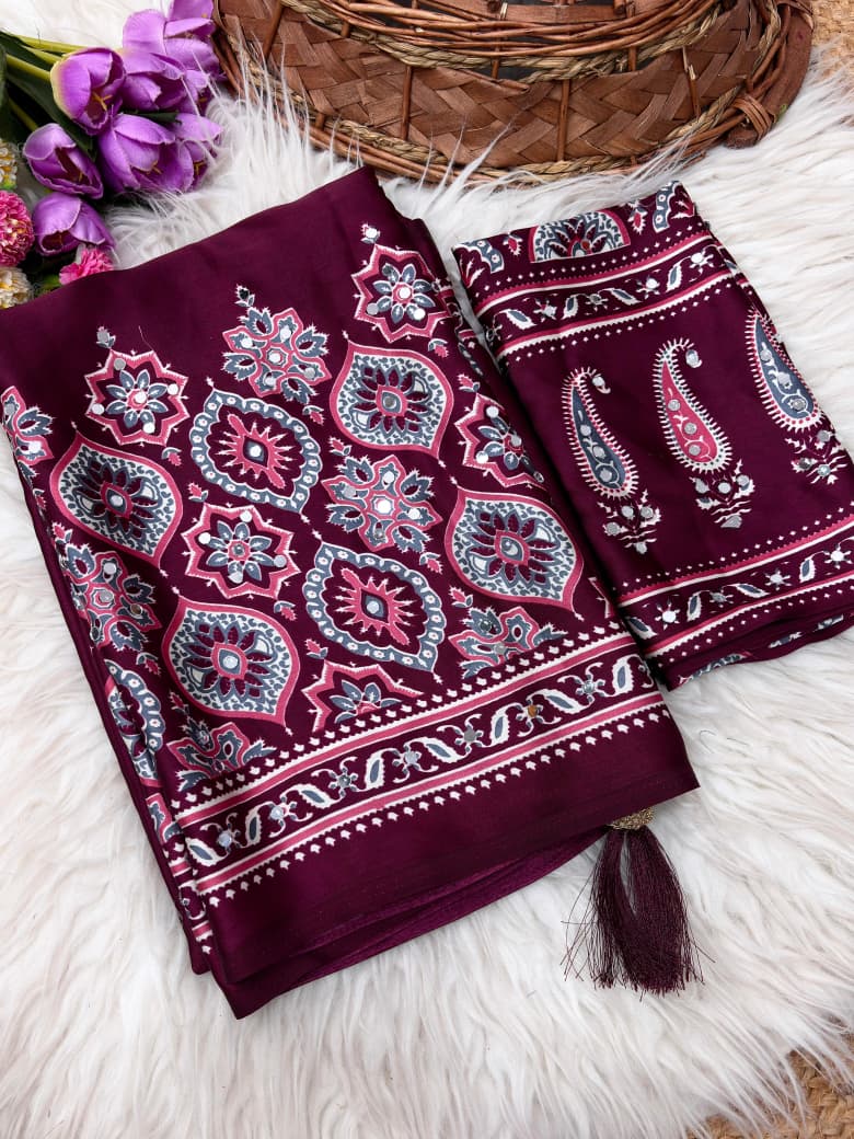 Wine colour saree with floral patterns 