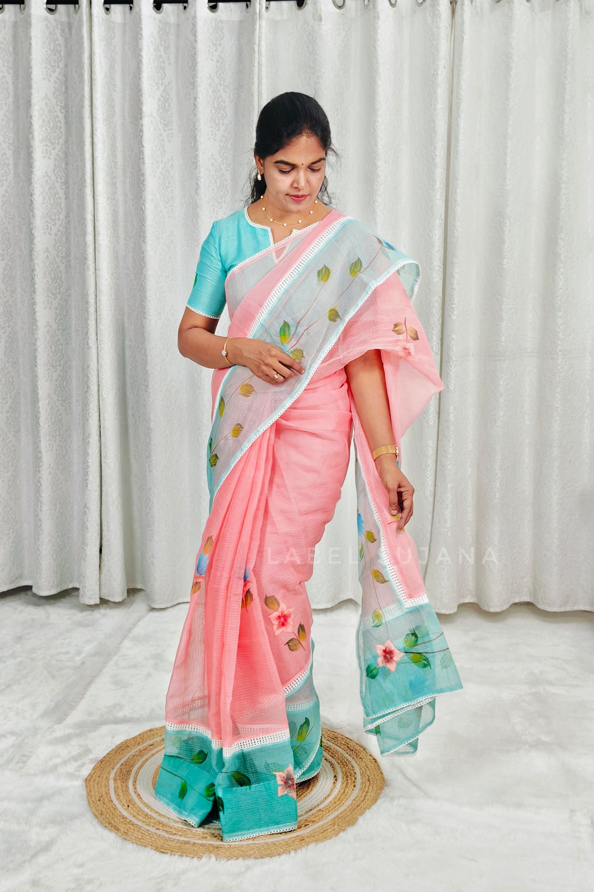 A Peach colour Brush Painted Kota Saree