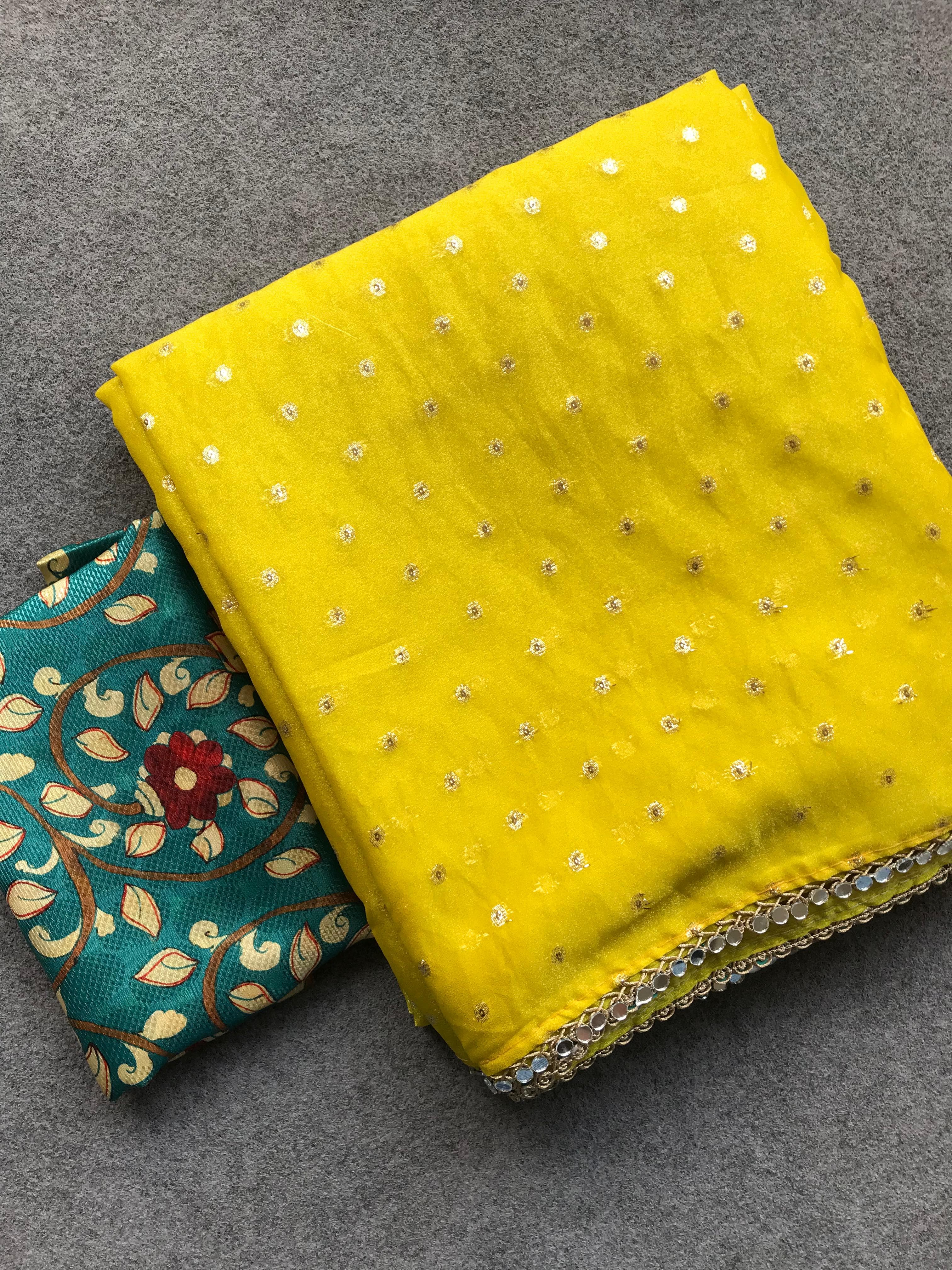  yellow  fabric with bead embellishments and the other teal with floral patterns