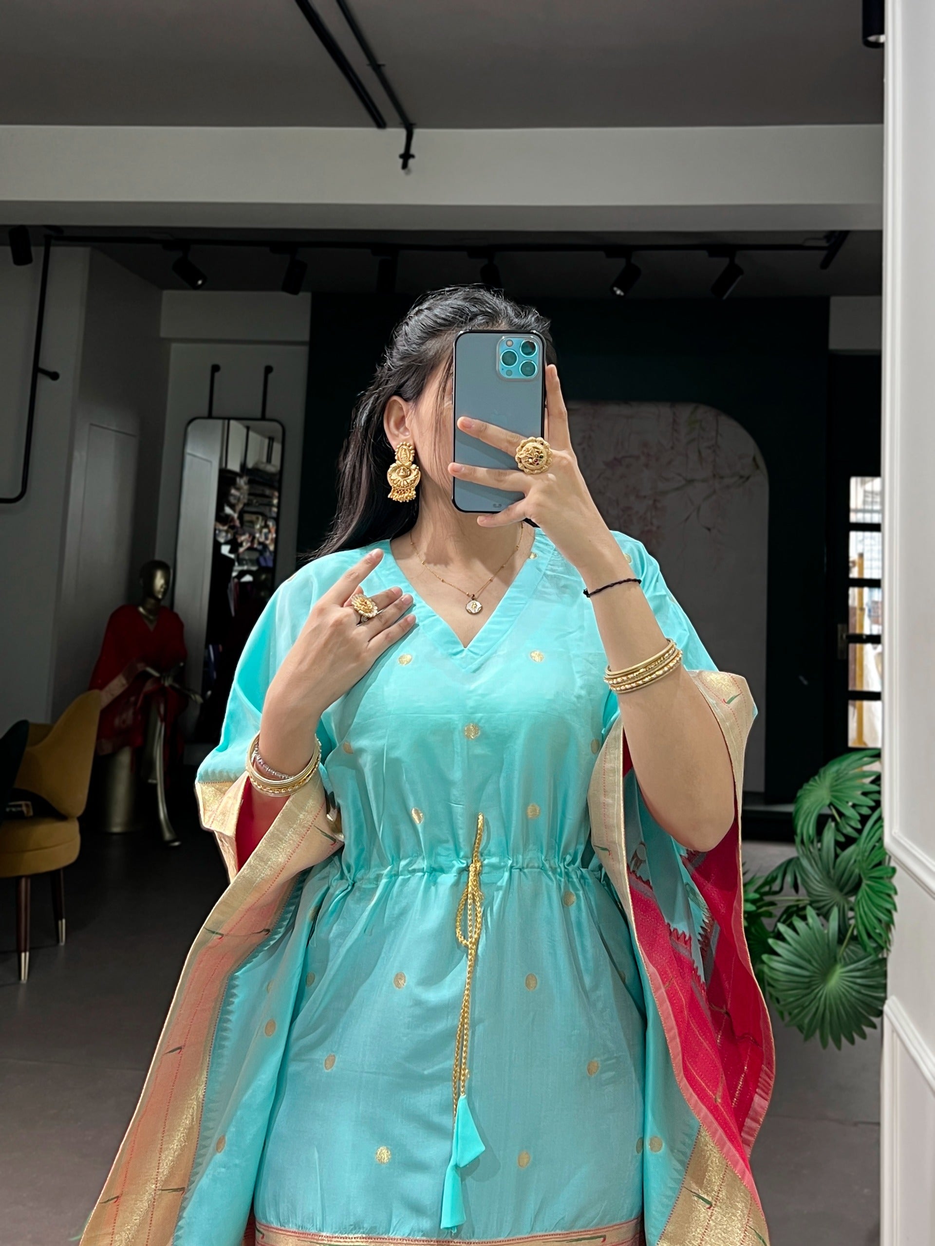Traditional sky blue outfit with gold border 